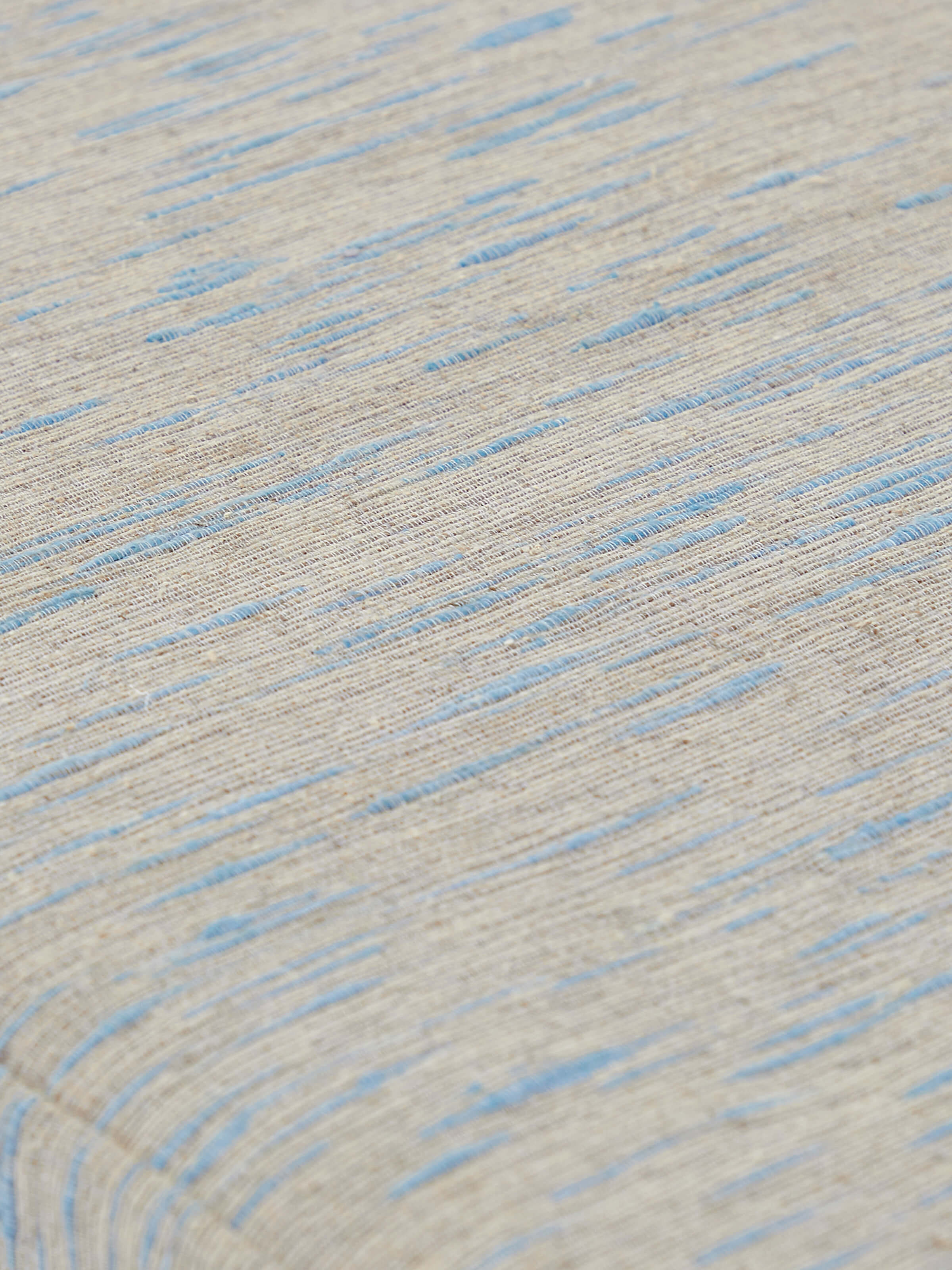 Angled view of the 2-seater bench, featuring its upholstered seat and elegant Sheesham wood legs.