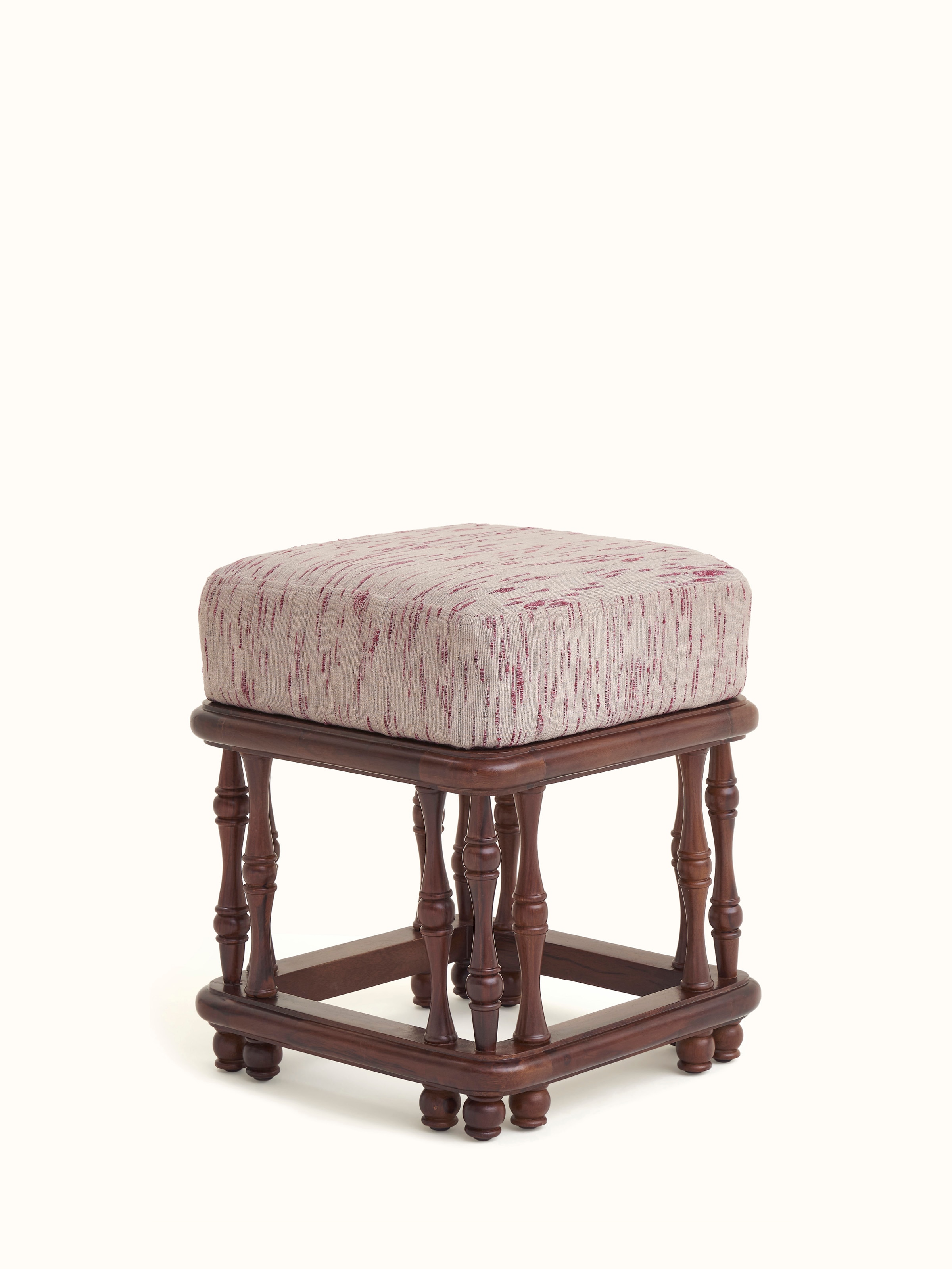 Top view of the upholstered Sheesham wood ottoman, showing the cushioning and fabric finish.
