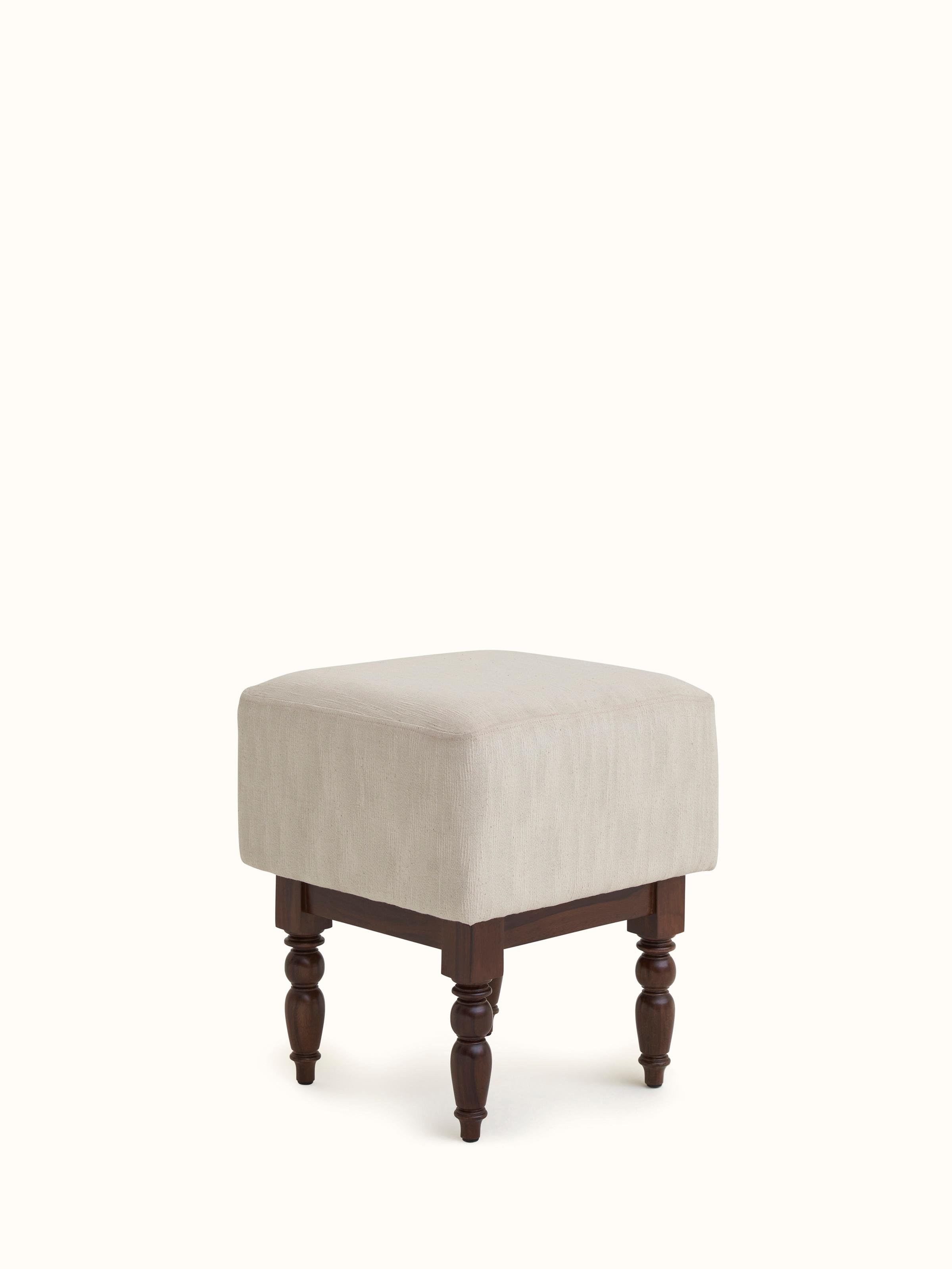 Detailed view of the upholstery on the Sheesham wood octagonal ottoman, emphasizing the fabric texture and wood finish.