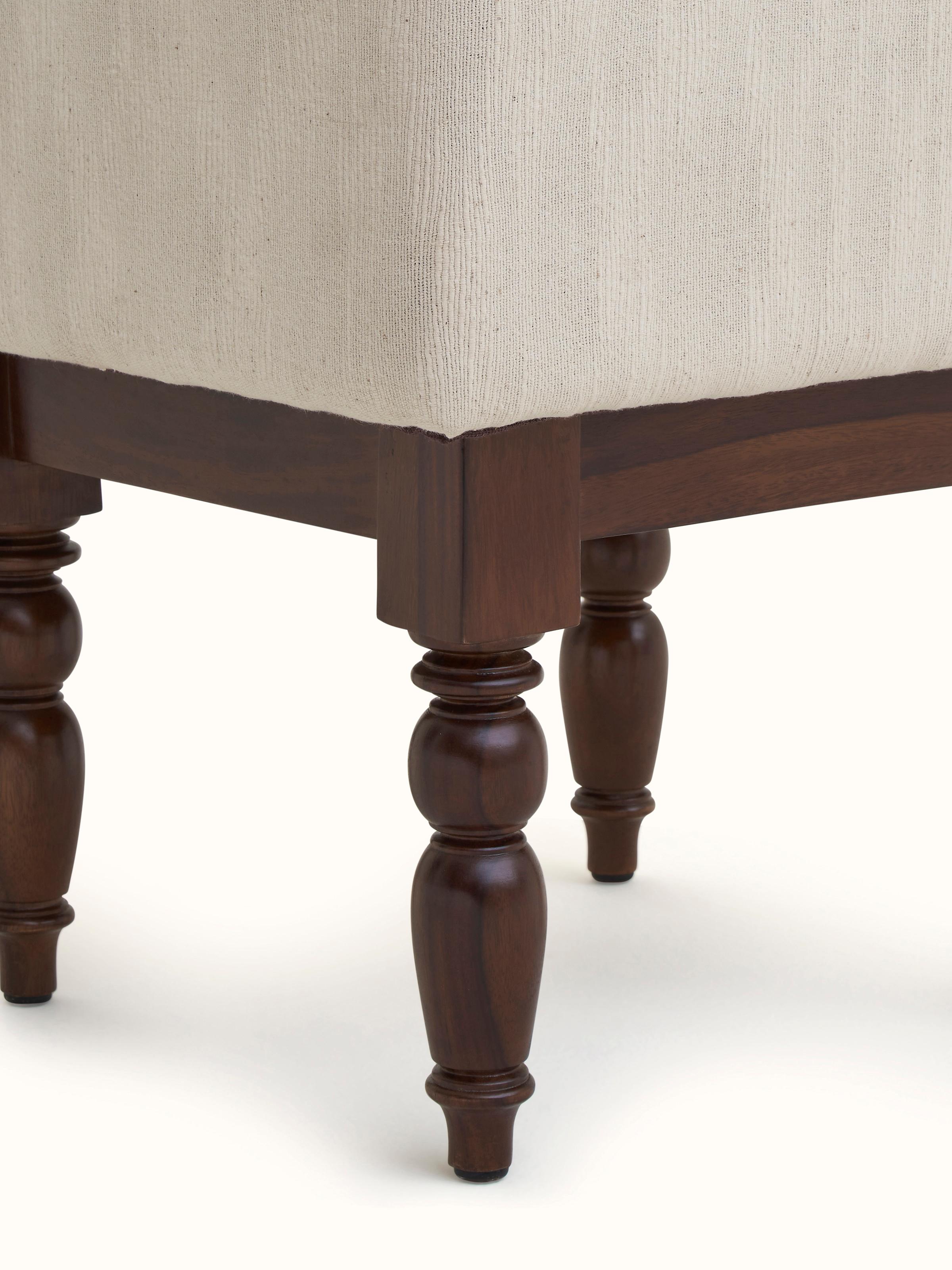 Top view of the upholstered Sheesham wood octagonal ottoman, showcasing the cushioned surface and octagonal shape.