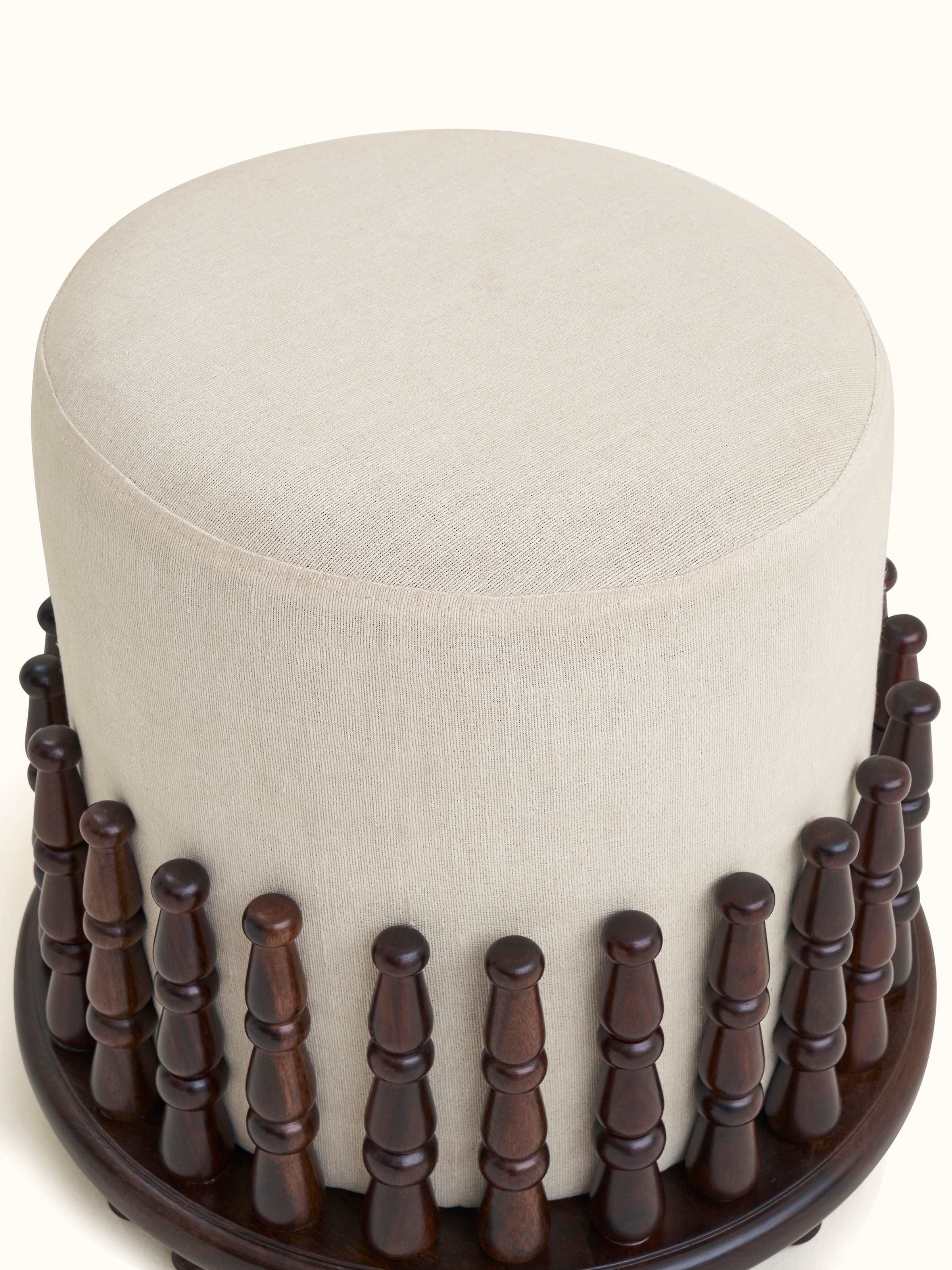 Top view of the upholstered Sheesham wood square pouffe, emphasizing the comfortable seating surface and fabric texture