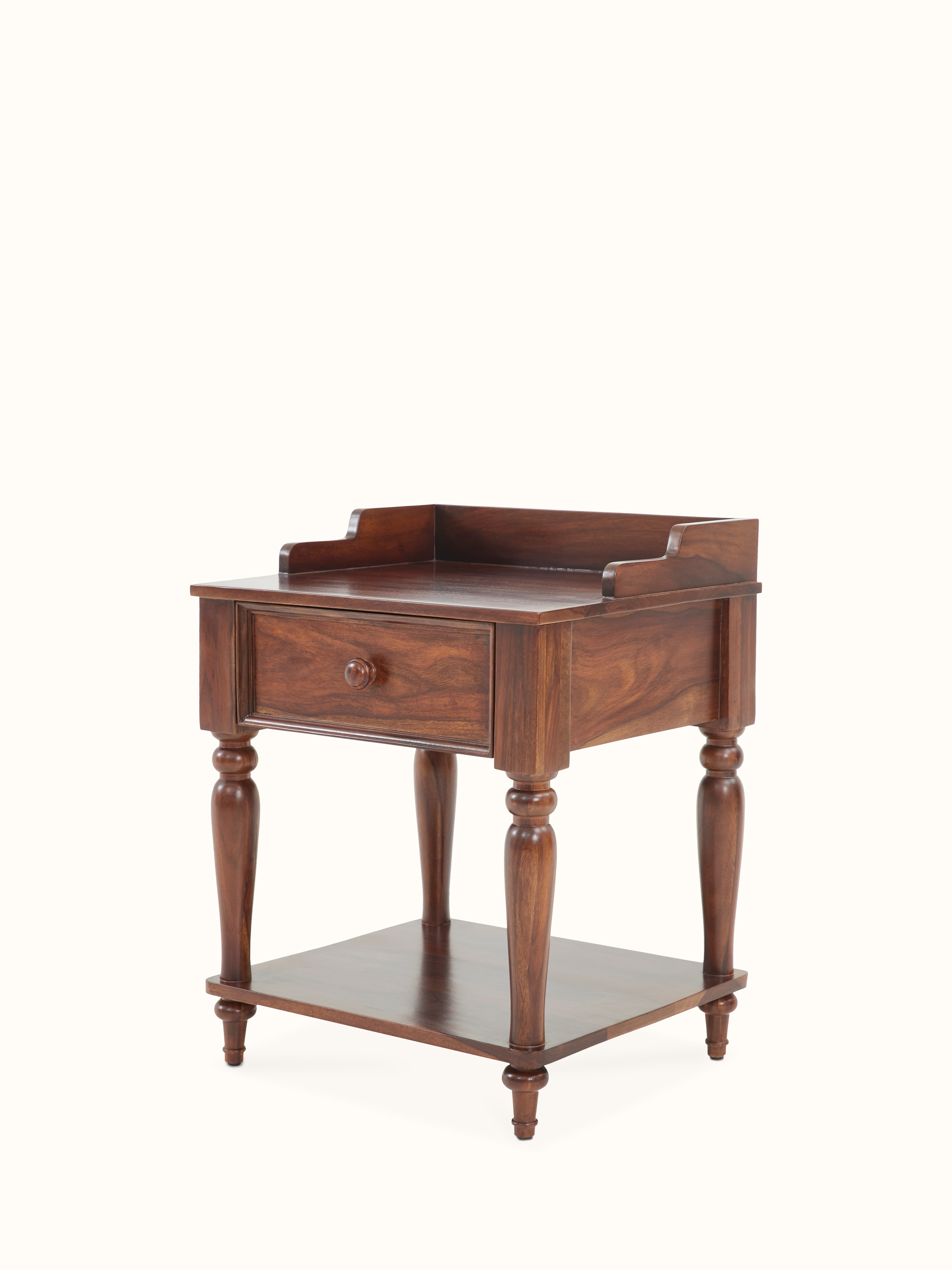 Detailed view of the teak finish Sheesham wood bedside table, focusing on the wood grain and craftsmanship.