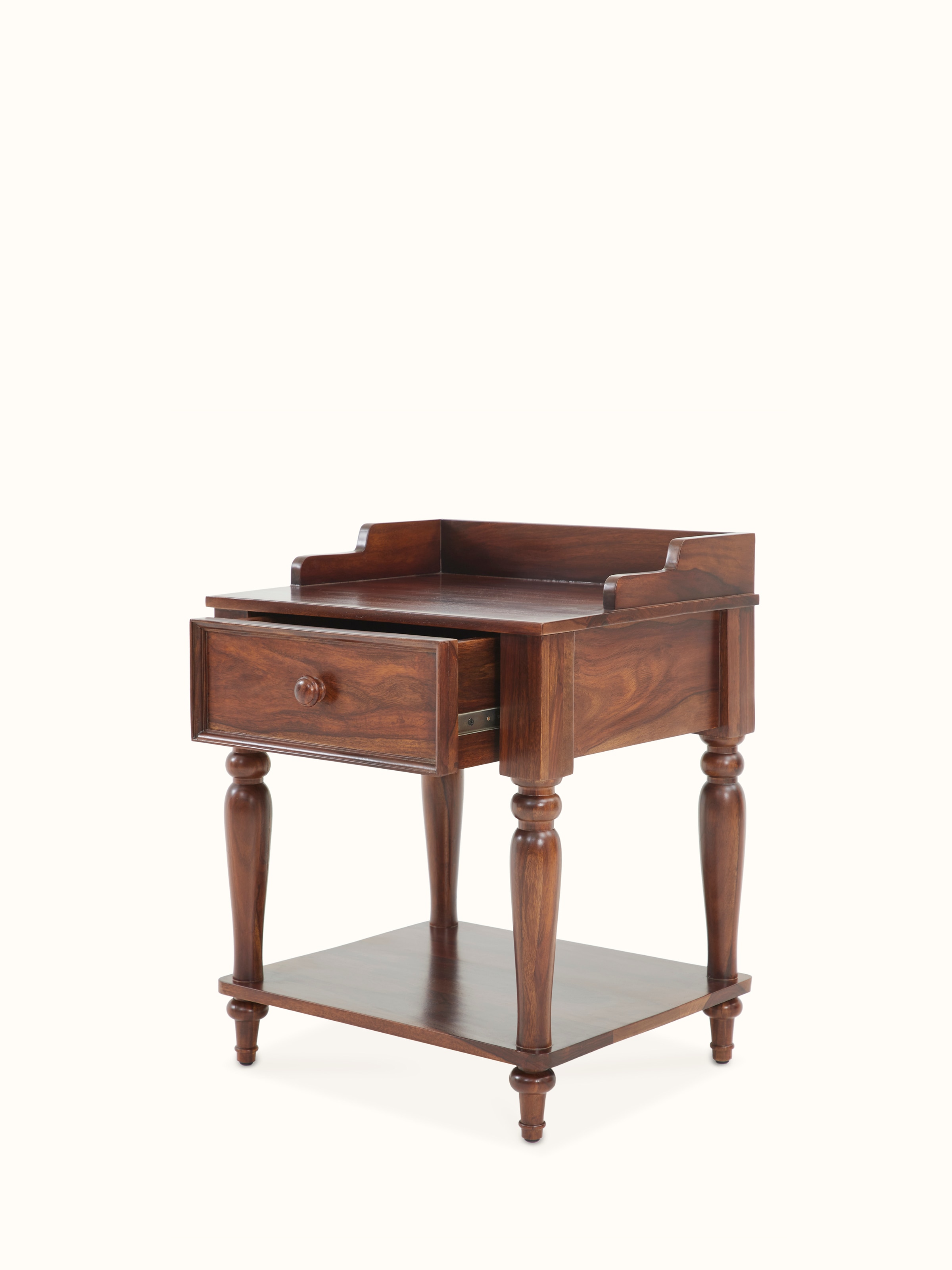 Perspective view of the teak finish Sheesham wood bedside table, highlighting the overall shape and design features.