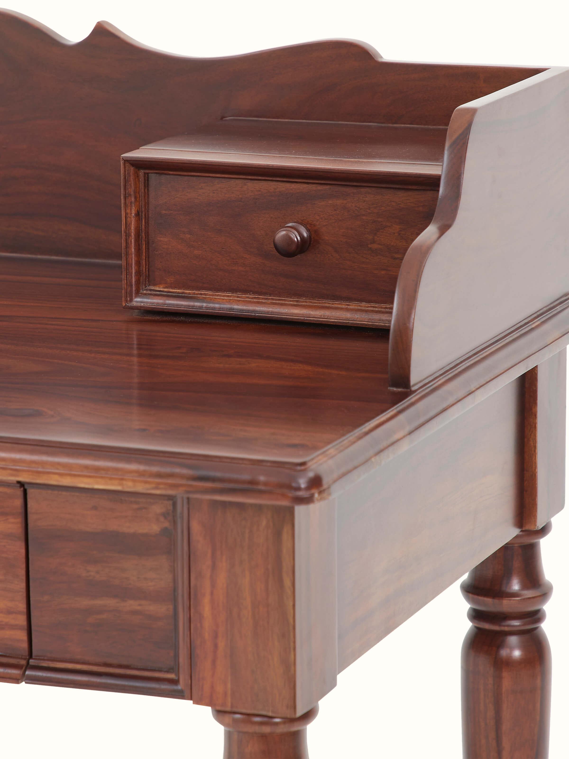 Detailed view of the Sheesham wood texture on the study table, highlighting its natural grain and finish