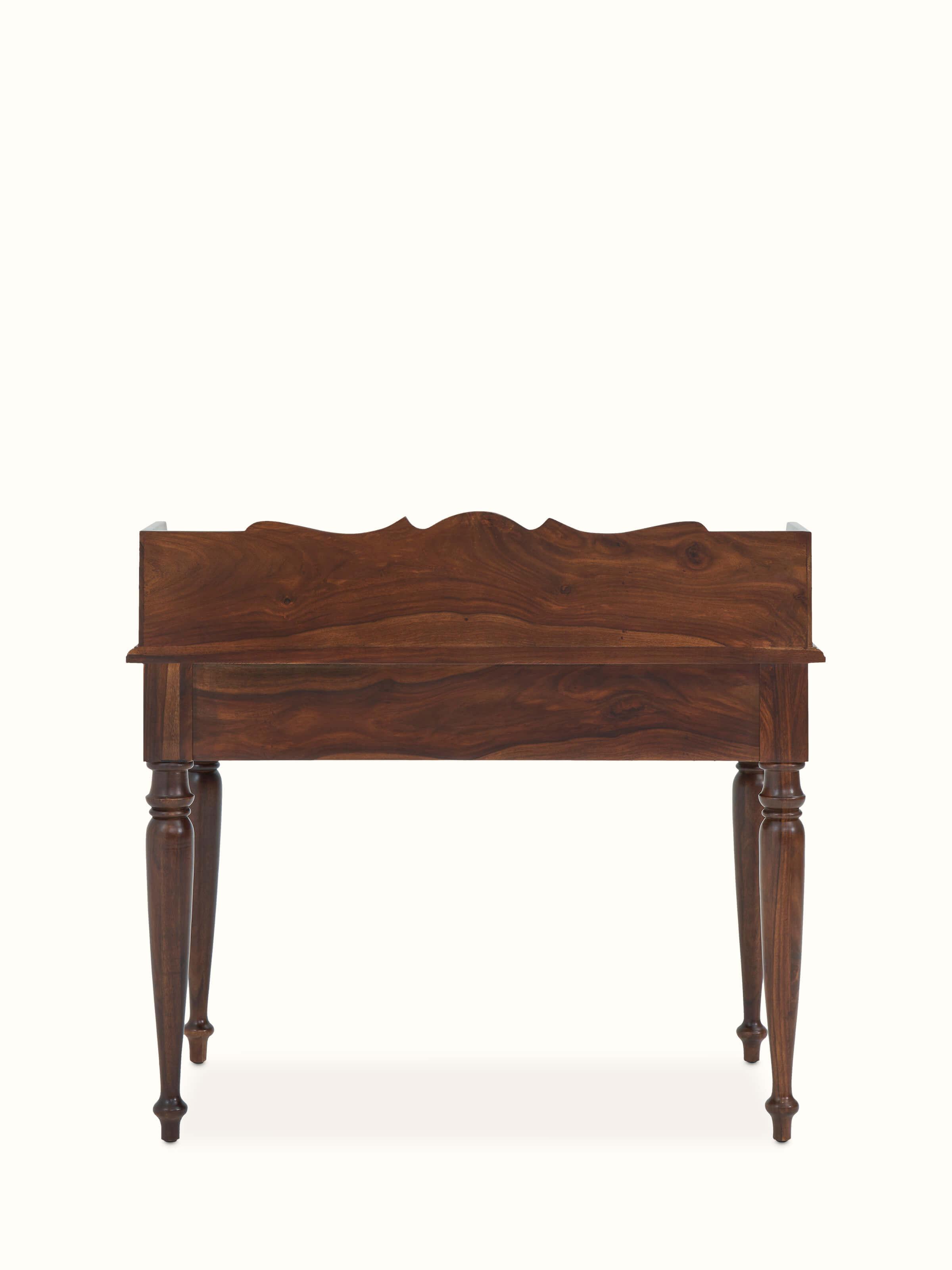 View of the Sheesham wood study table in a room setting, demonstrating its functionality and integration into the space