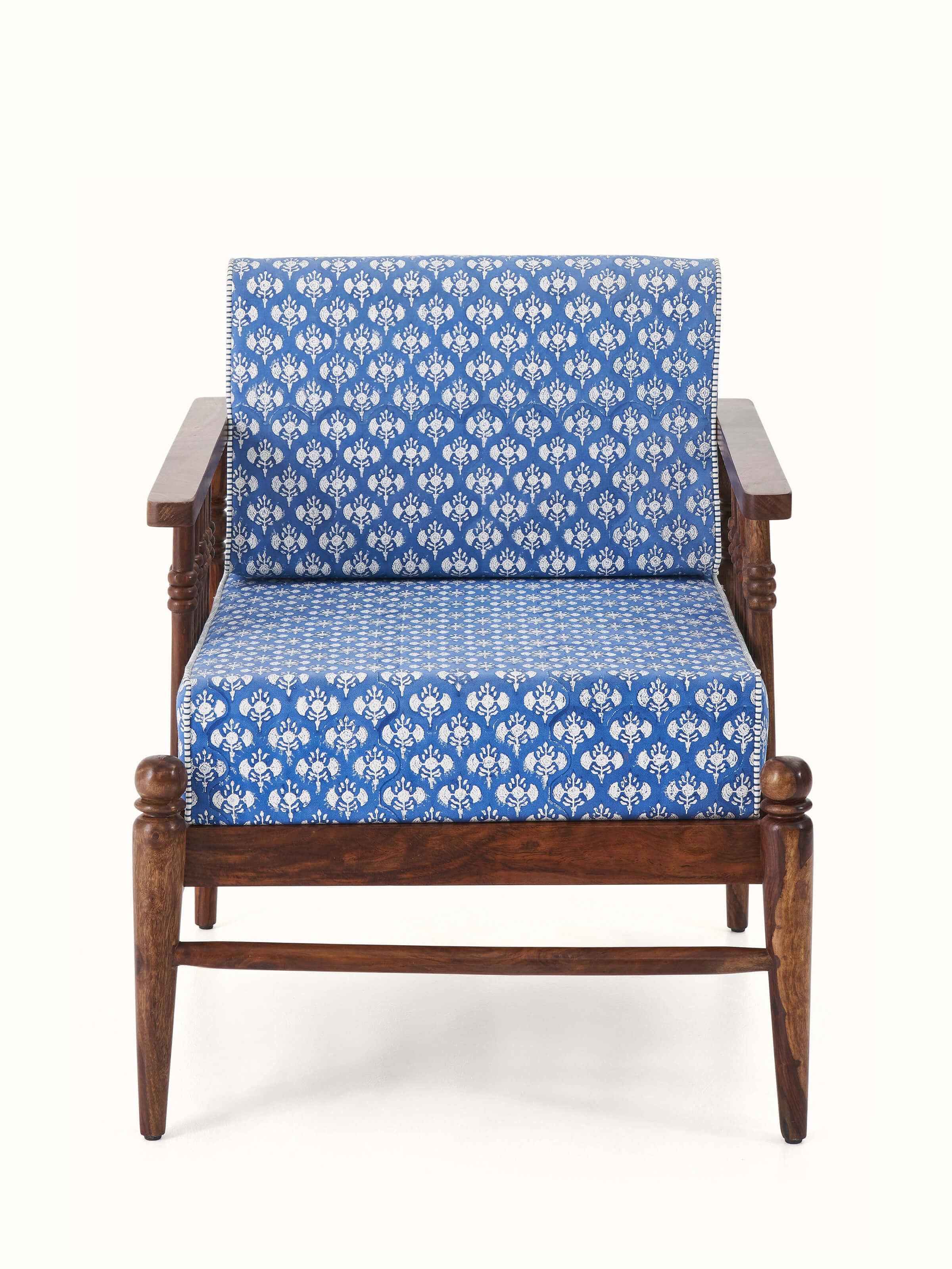 Front view of Upholstered Sheesham Wood Sanganeri Block Print Lounge Chair with rich block print upholstery and wooden frame.
