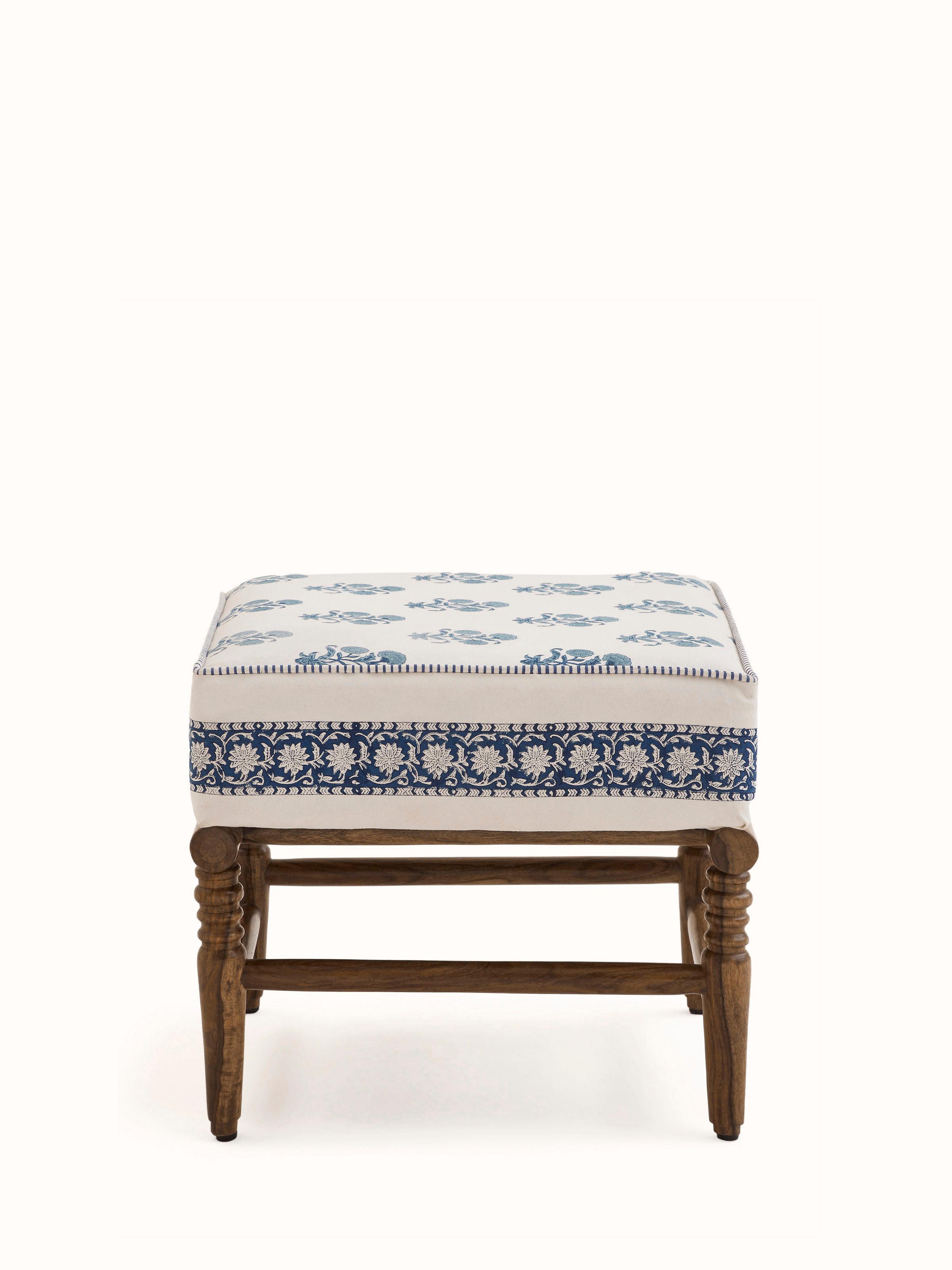 Front view of the Sheesham wood Sanganeri block print ottoman, featuring traditional block print upholstery and wooden frame