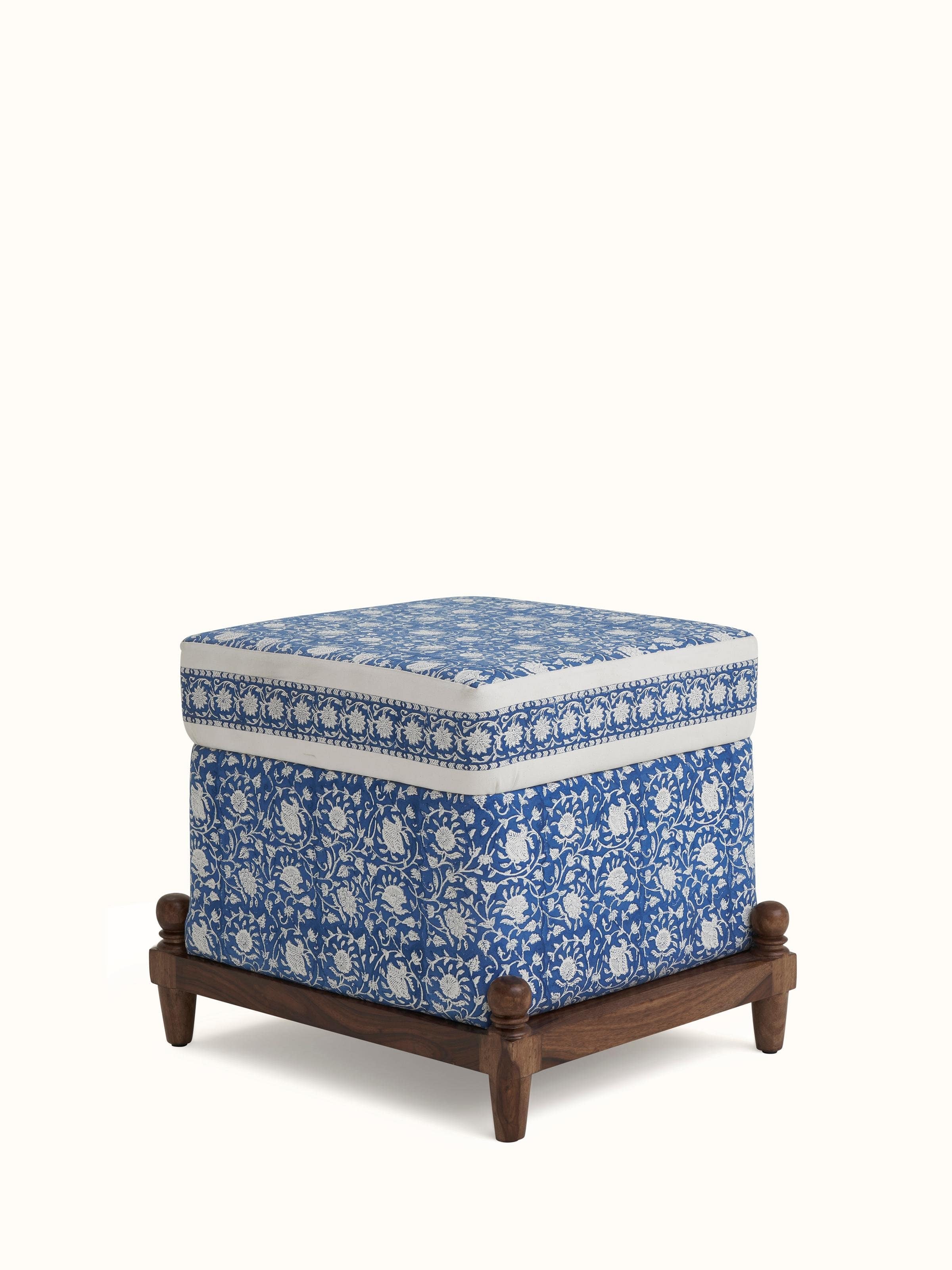 Close-up view of Upholstered Sheesham Wood Sanganeri Block Print Pouffe, emphasizing the detailed block print and texture of the upholstery