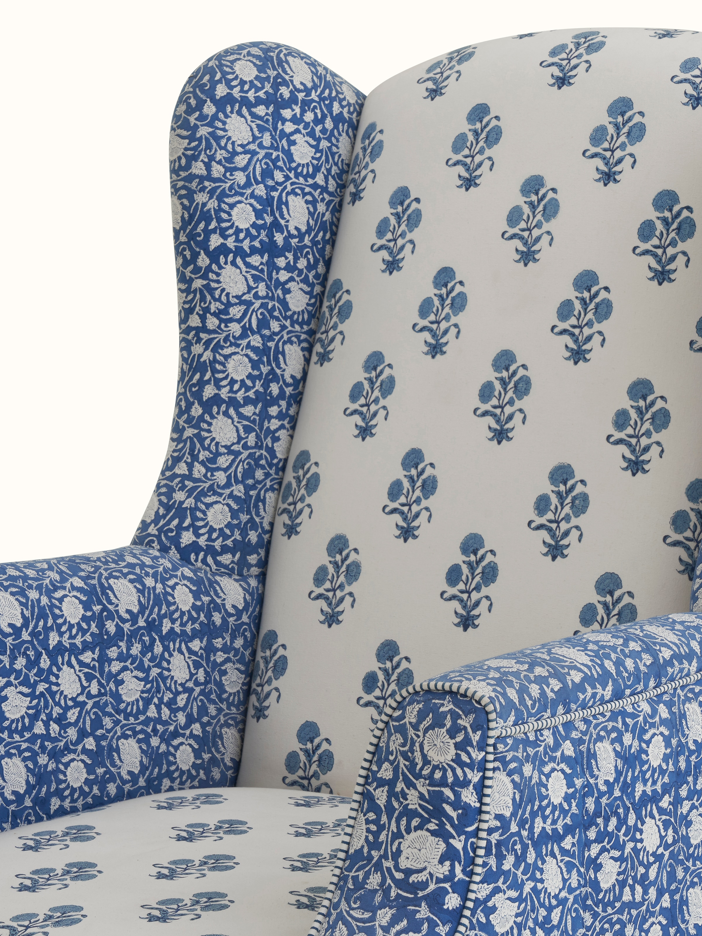 Detailed view of the Sheesham wood frame and block print upholstery, focusing on the high-quality materials and design