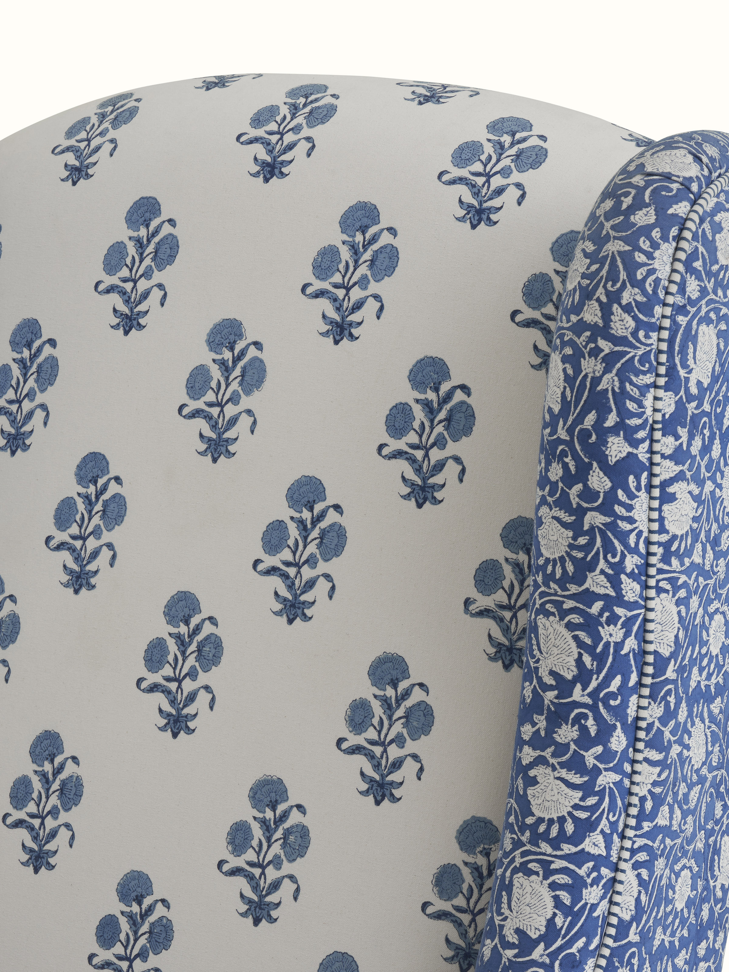 View of the chair from above, showing the block print upholstery and high back wings in detail