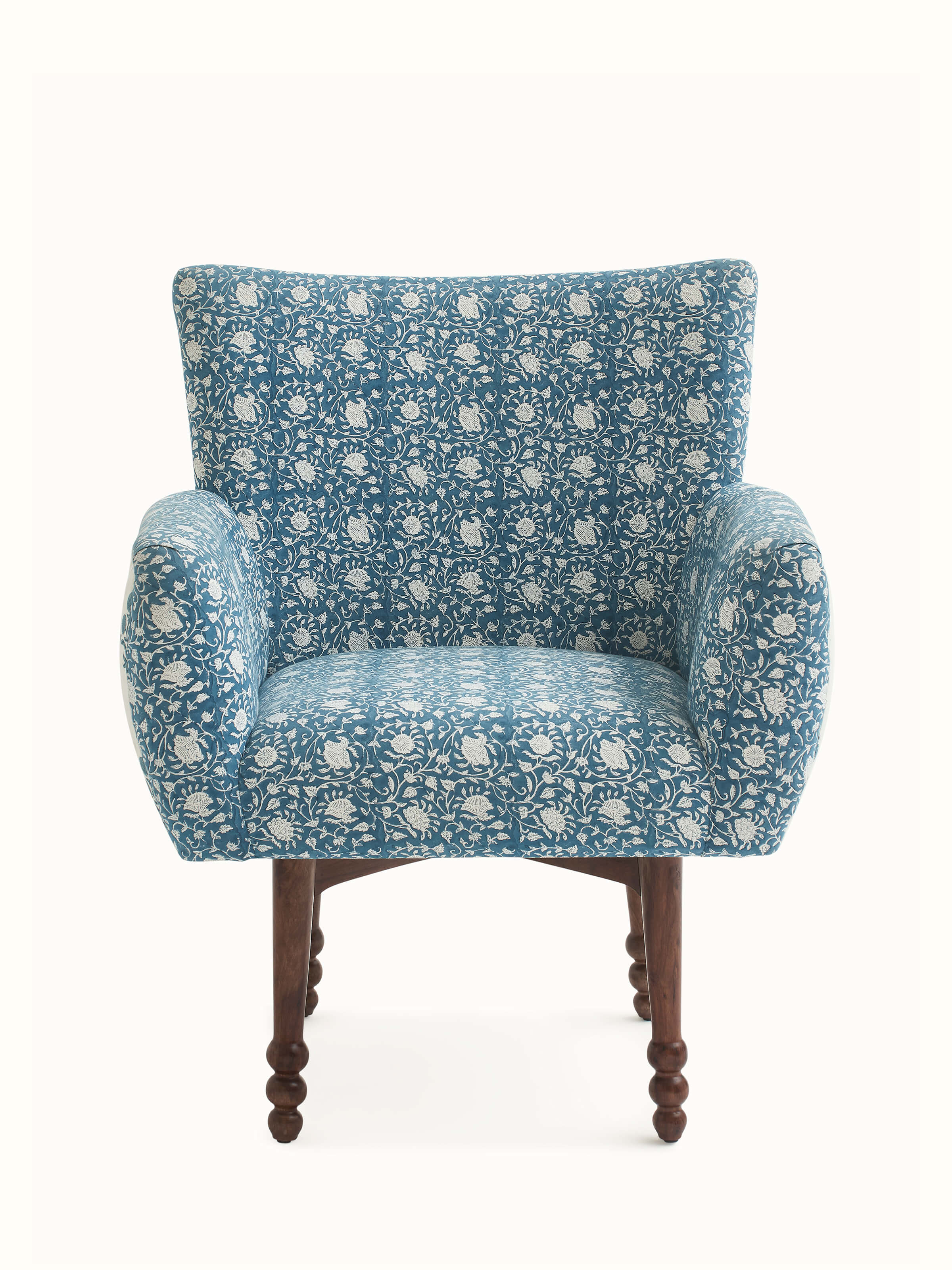 Front view of Upholstered Sheesham Wood Sanganeri Block Print Wing Chair, showcasing intricate block print fabric and elegant winged design