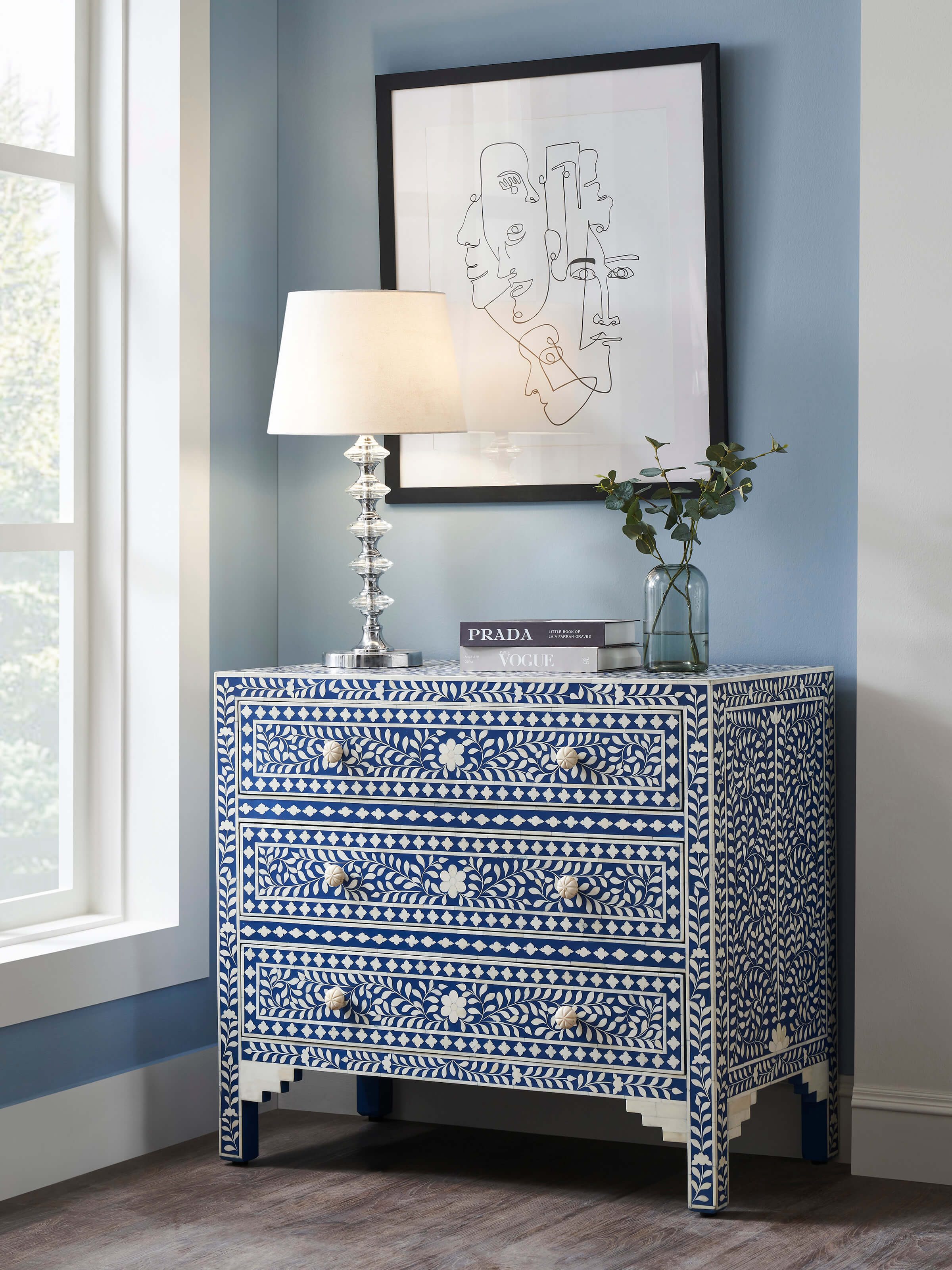 Side view of Bone Inlaid Chest of Drawers highlighting the detailed bone inlay work and drawer handles