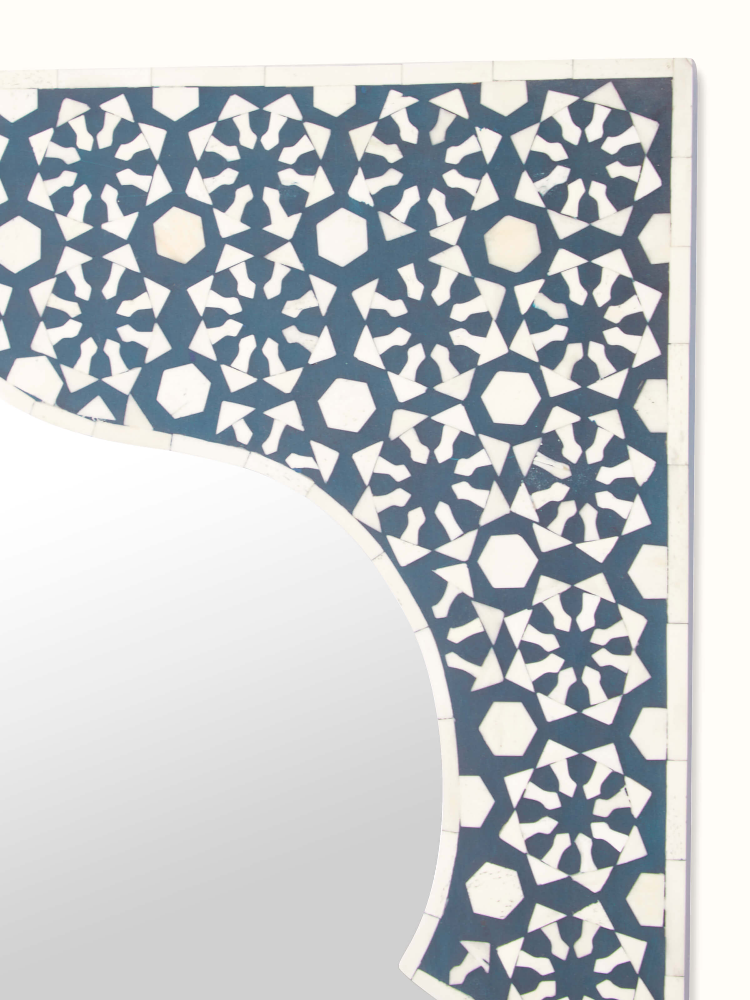 Detailed view of Bone Inlaid Mirror, focusing on the inlay design and mirror reflection