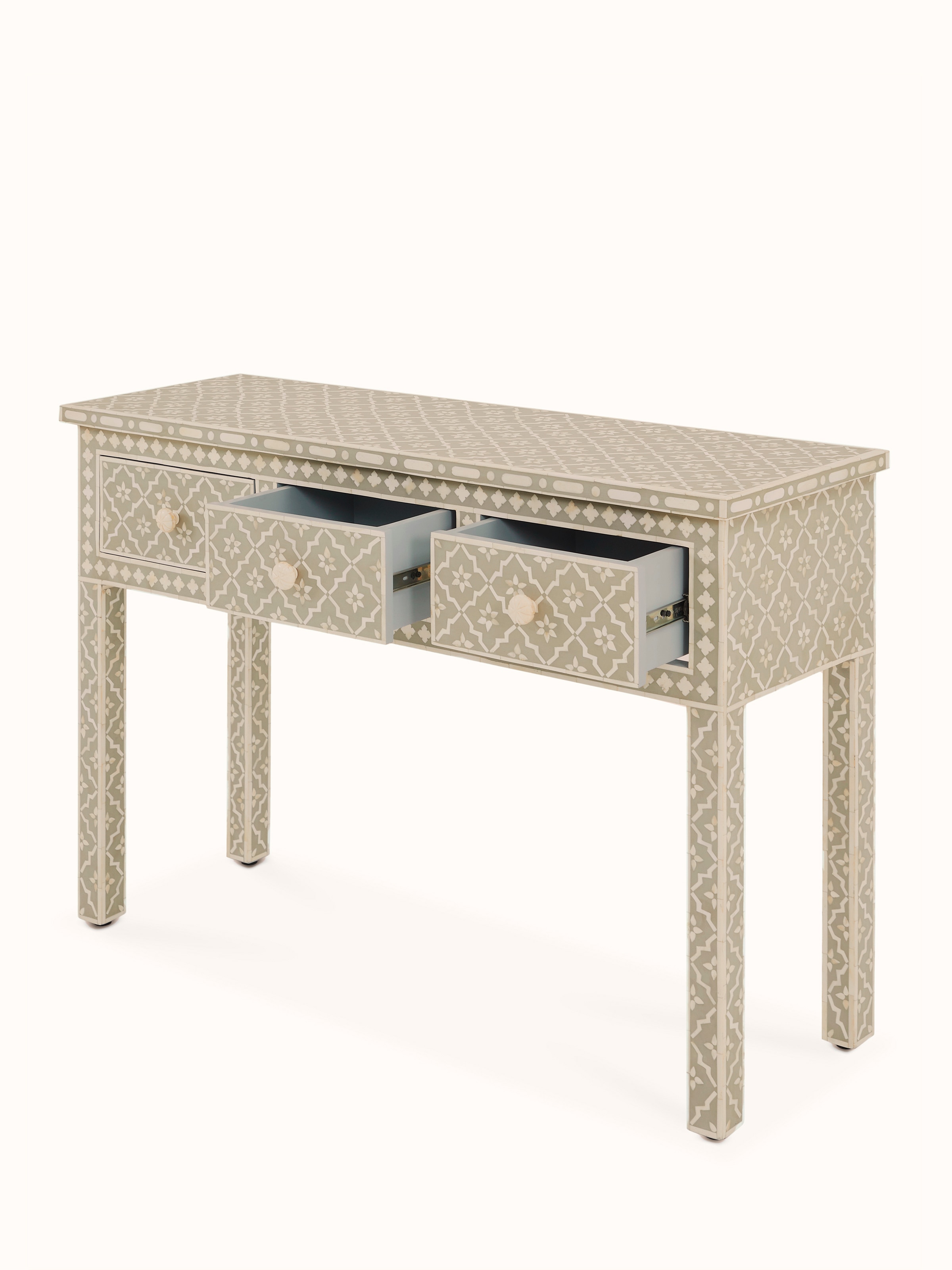Overall view of the bone inlaid console table with focus on design and functionality