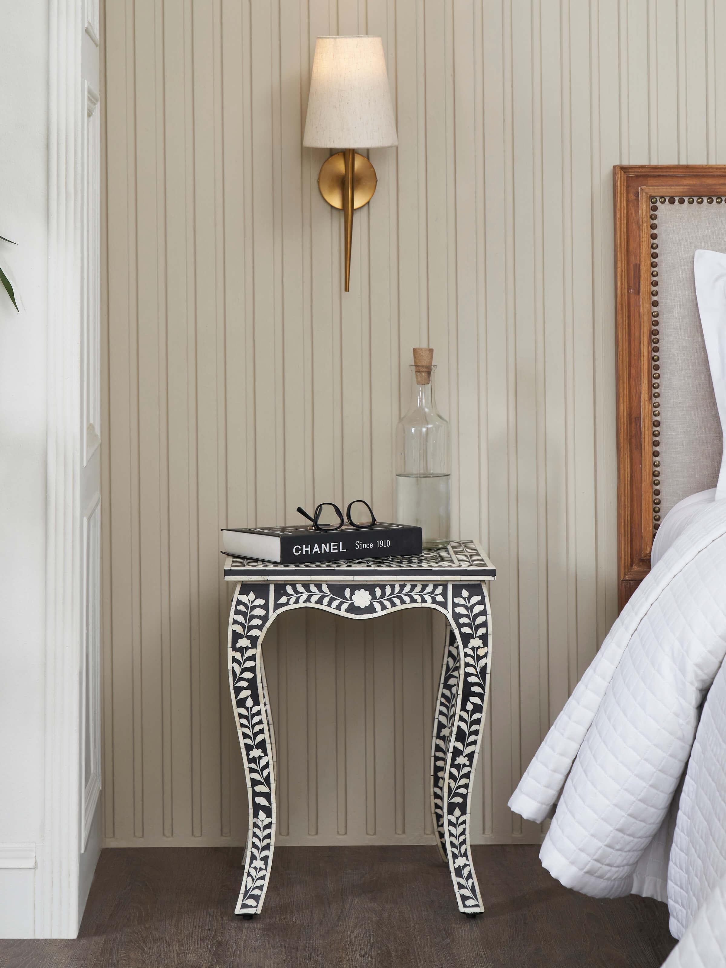 Side angle of Bone Inlaid Side Table, highlighting the detailed inlay work and the table's structural design