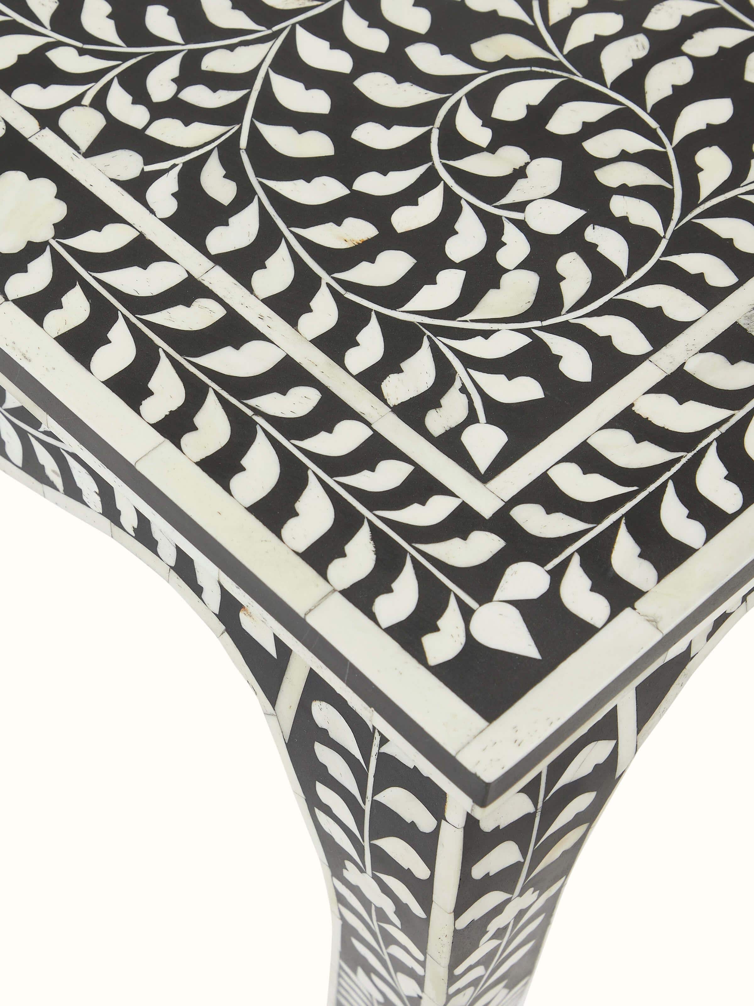 Detailed view of the Bone Inlaid Side Table's inlay design, showcasing the fine craftsmanship and decorative elements