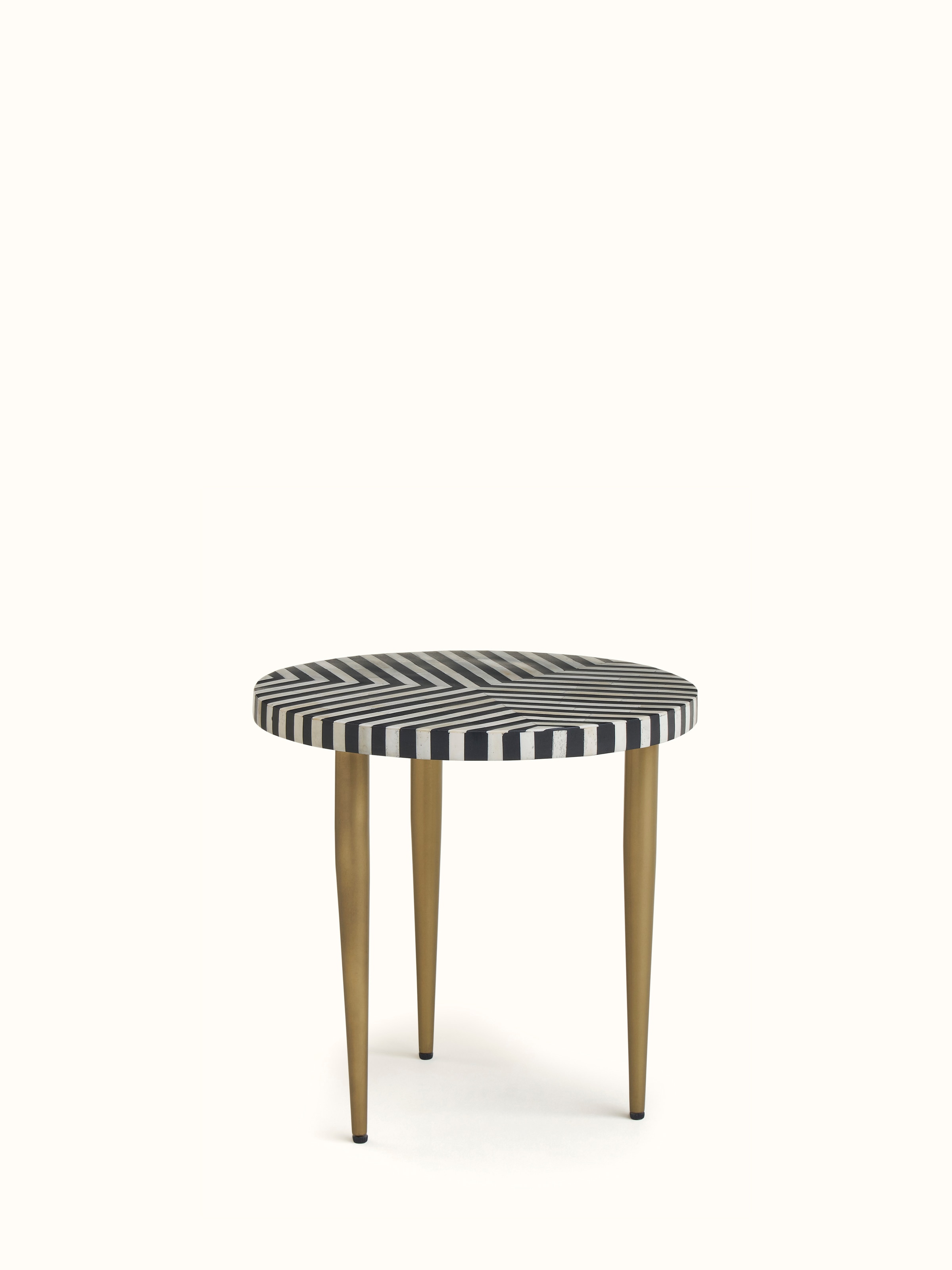 Close-up of the bone inlaid design on the nesting tables, emphasizing the detailed patterns