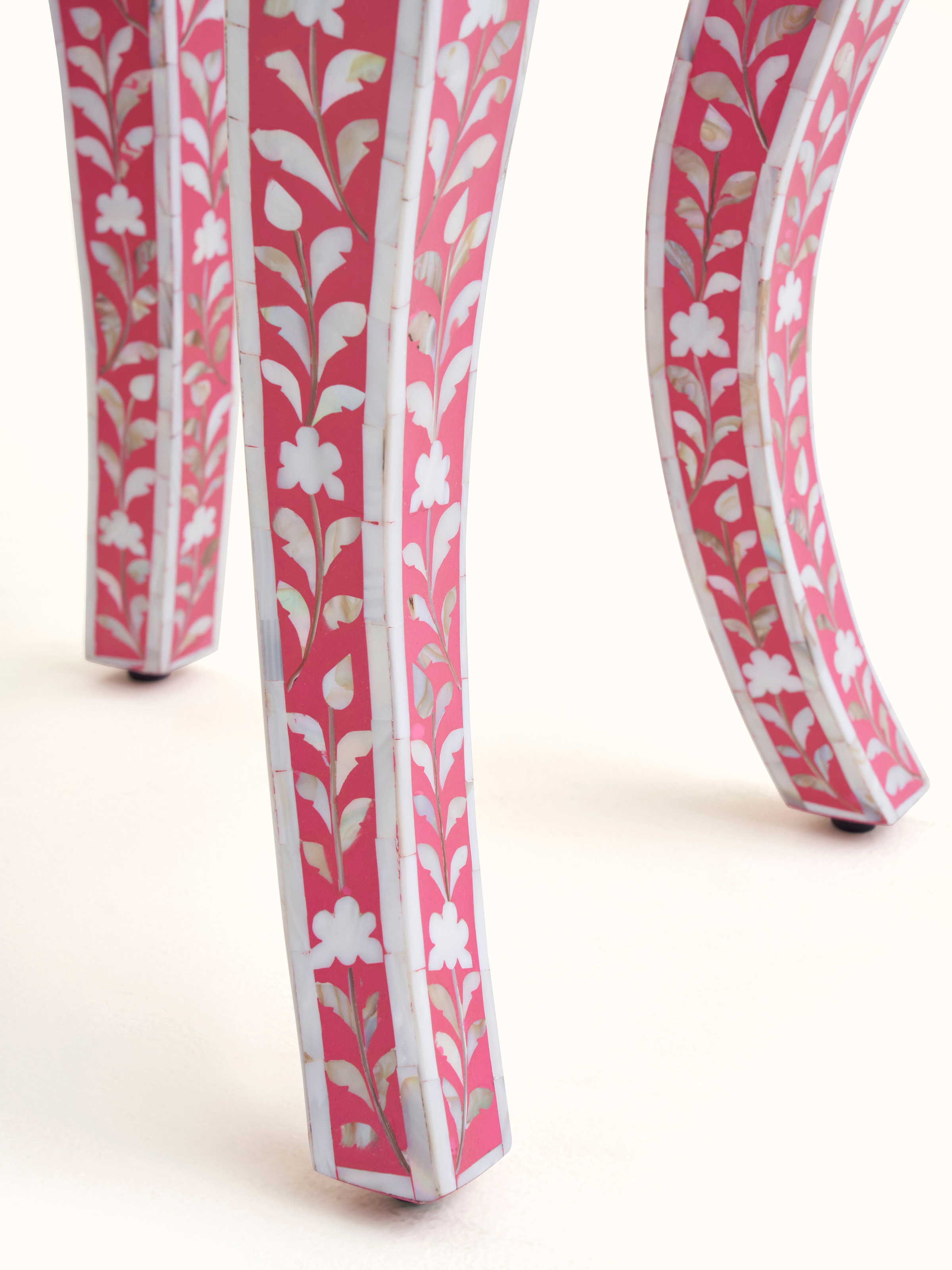 Artistic view of the mother-of-pearl inlaid side table, capturing the elegance and intricate patterns of the inlay work