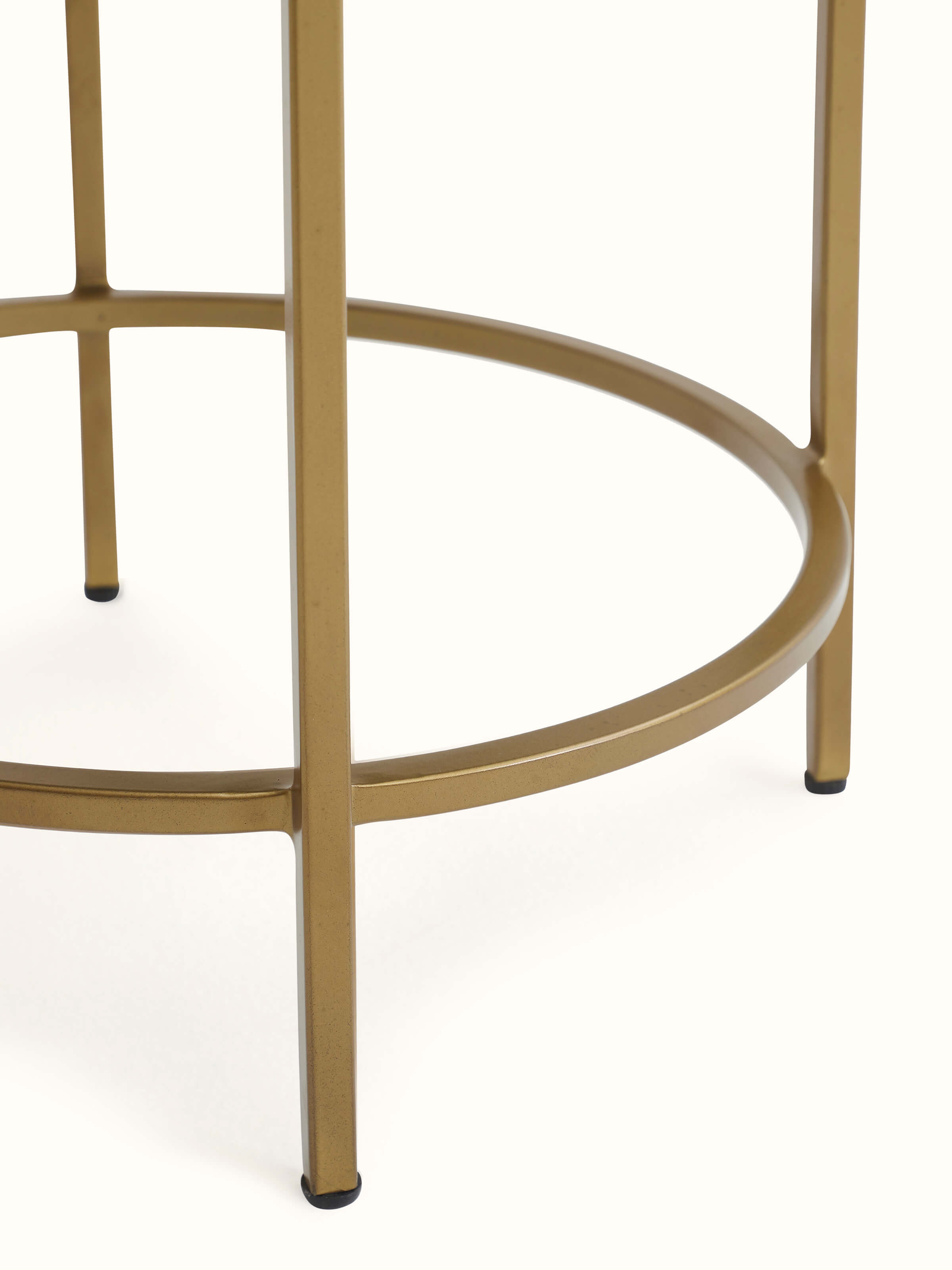 Top view of the upholstered metal stool with bone inlay, highlighting the pattern and upholstery details.