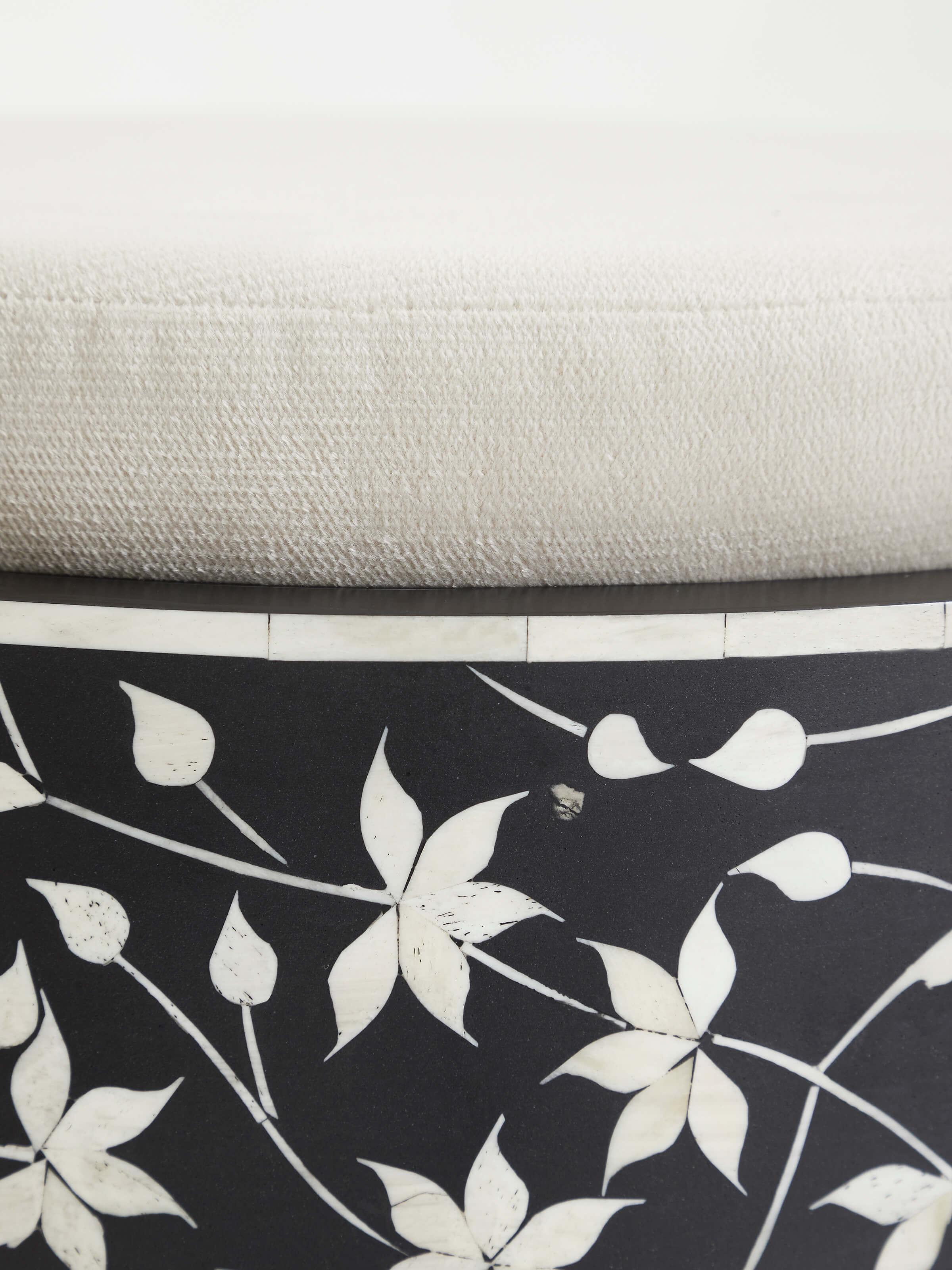Close-up of the legs and frame of the bone inlaid Sheesham wood stool, highlighting the wood grain and elegant finish.