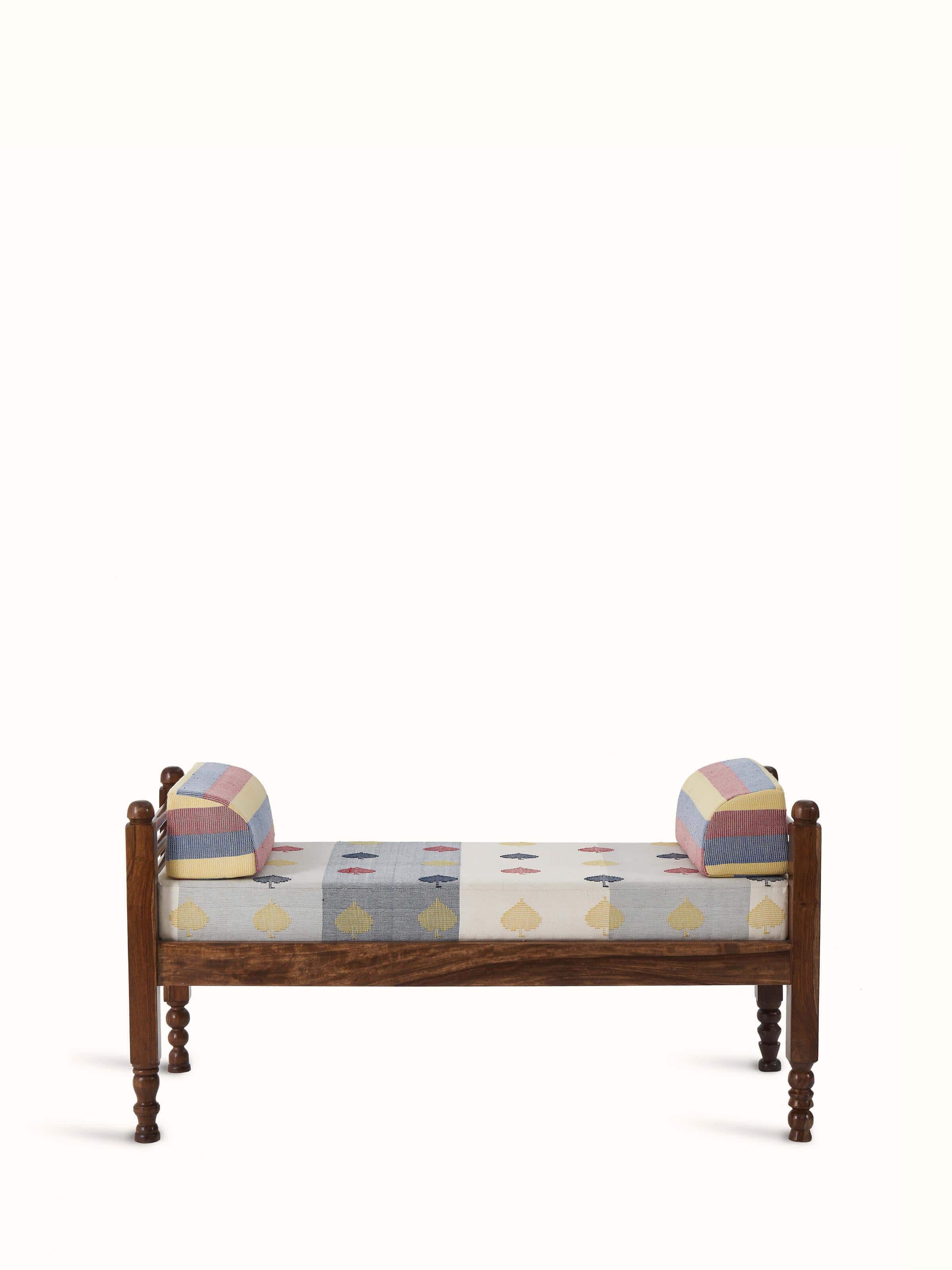 Bawan buti patterned upholstered 2-seater bench in sheesham wood, featuring a traditional design and intricate detailing.