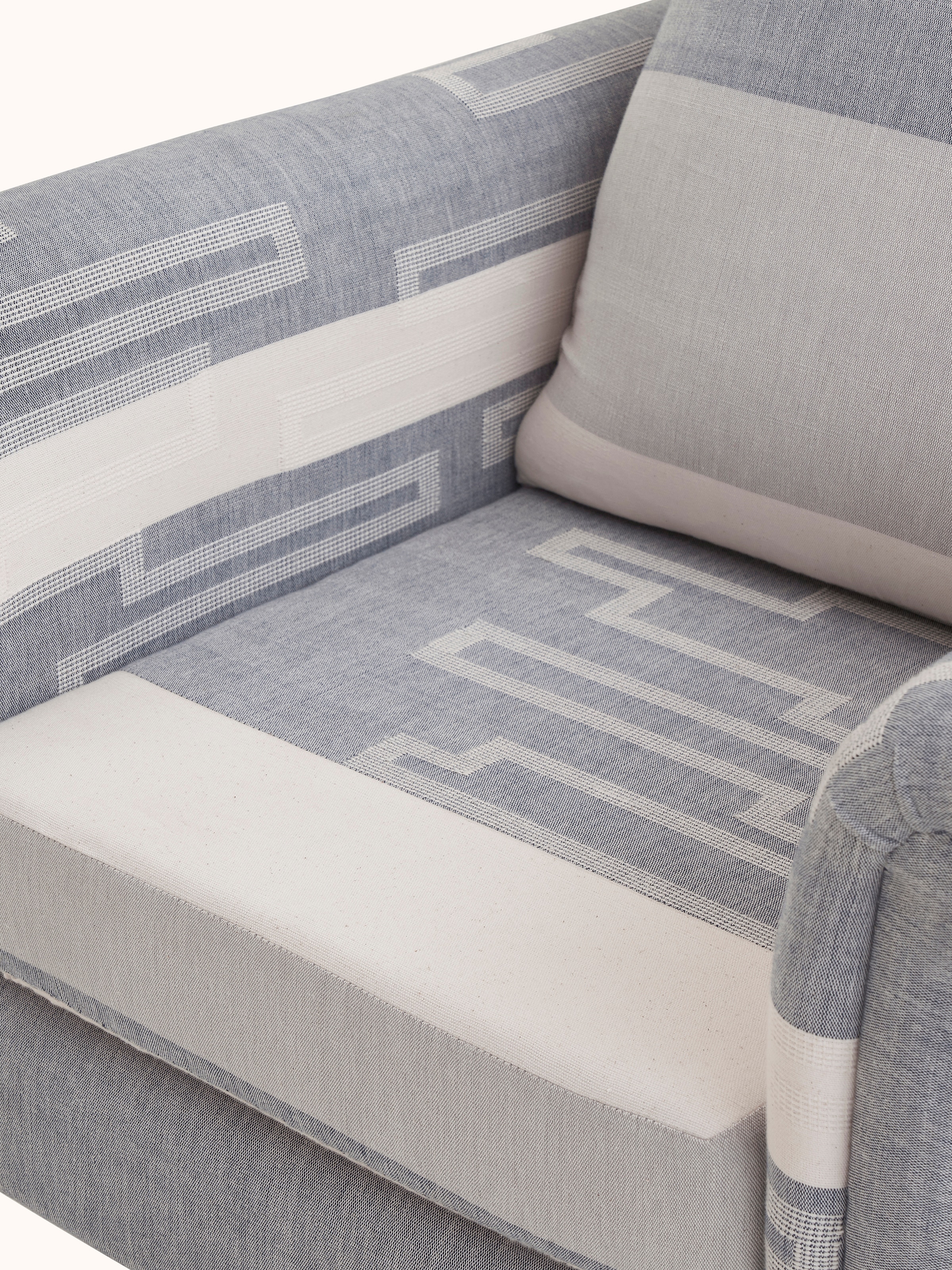 Detailed view of Sheesham Wood Bawan Buti Lounge Chair, showing the texture and finish of the wood