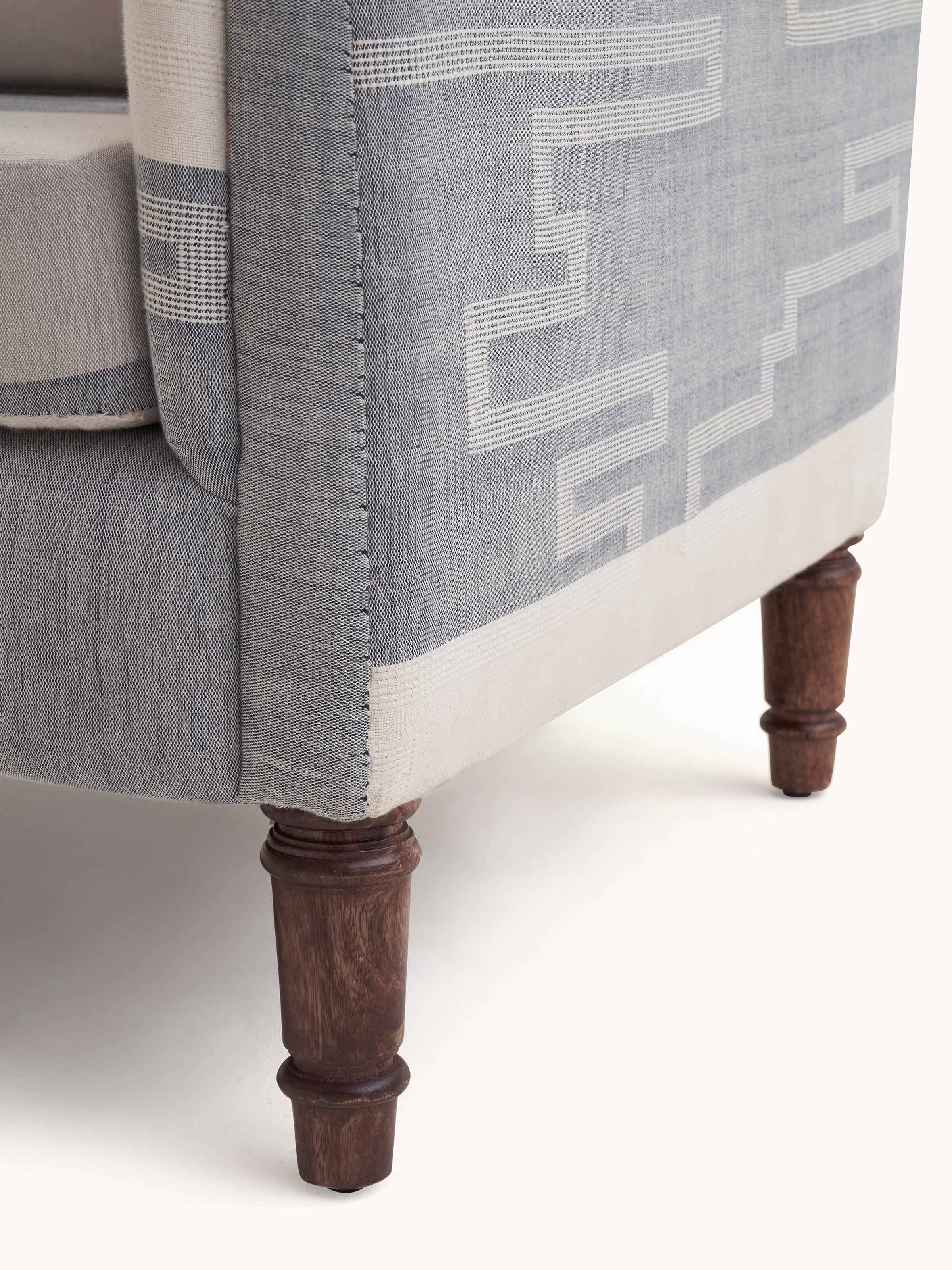 Angle view of Sheesham Wood Bawan Buti Lounge Chair, featuring the elegant lines and traditional design elements