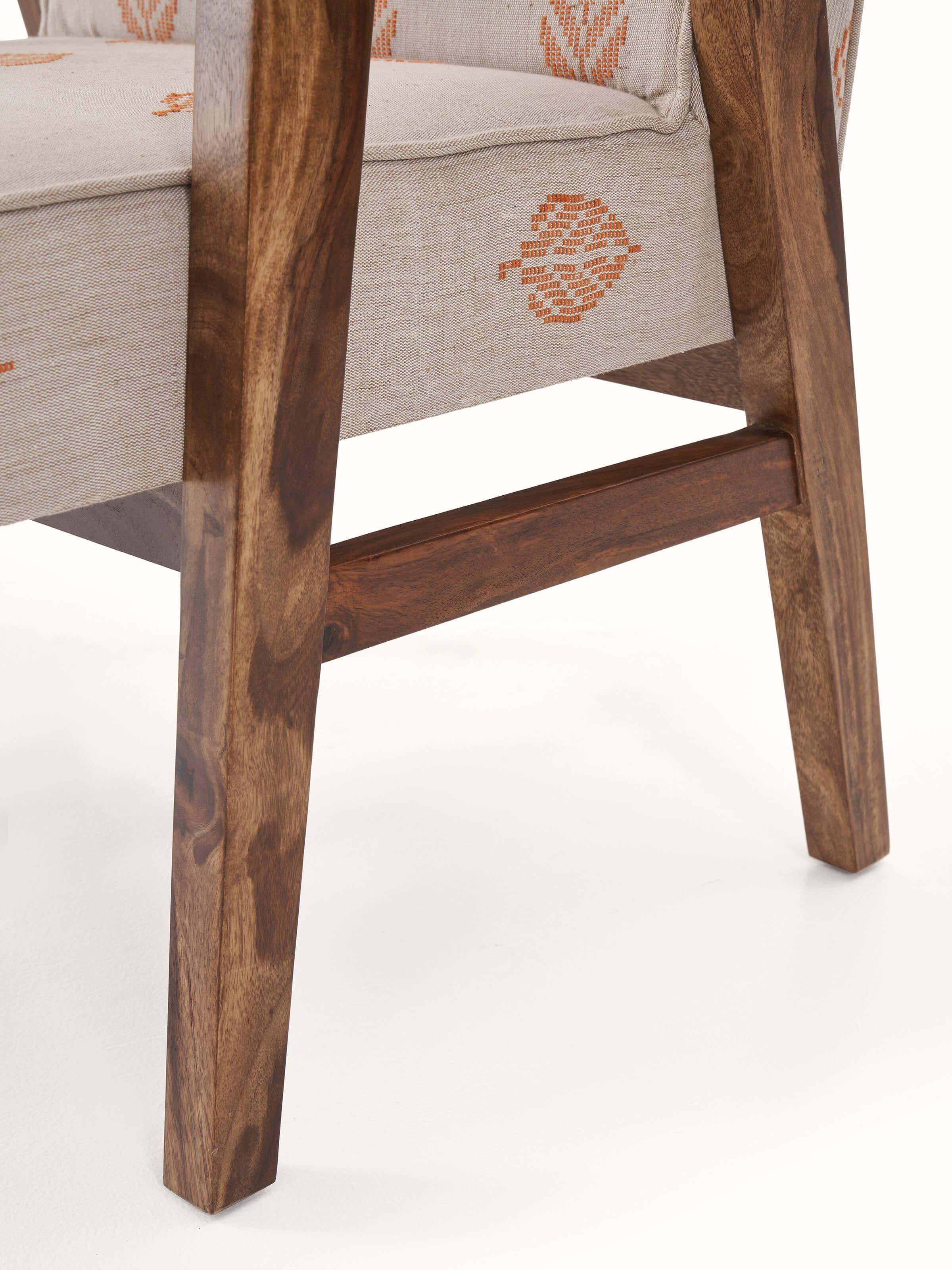 Detailed view of the Sheesham wood frame and upholstery on the study chair.