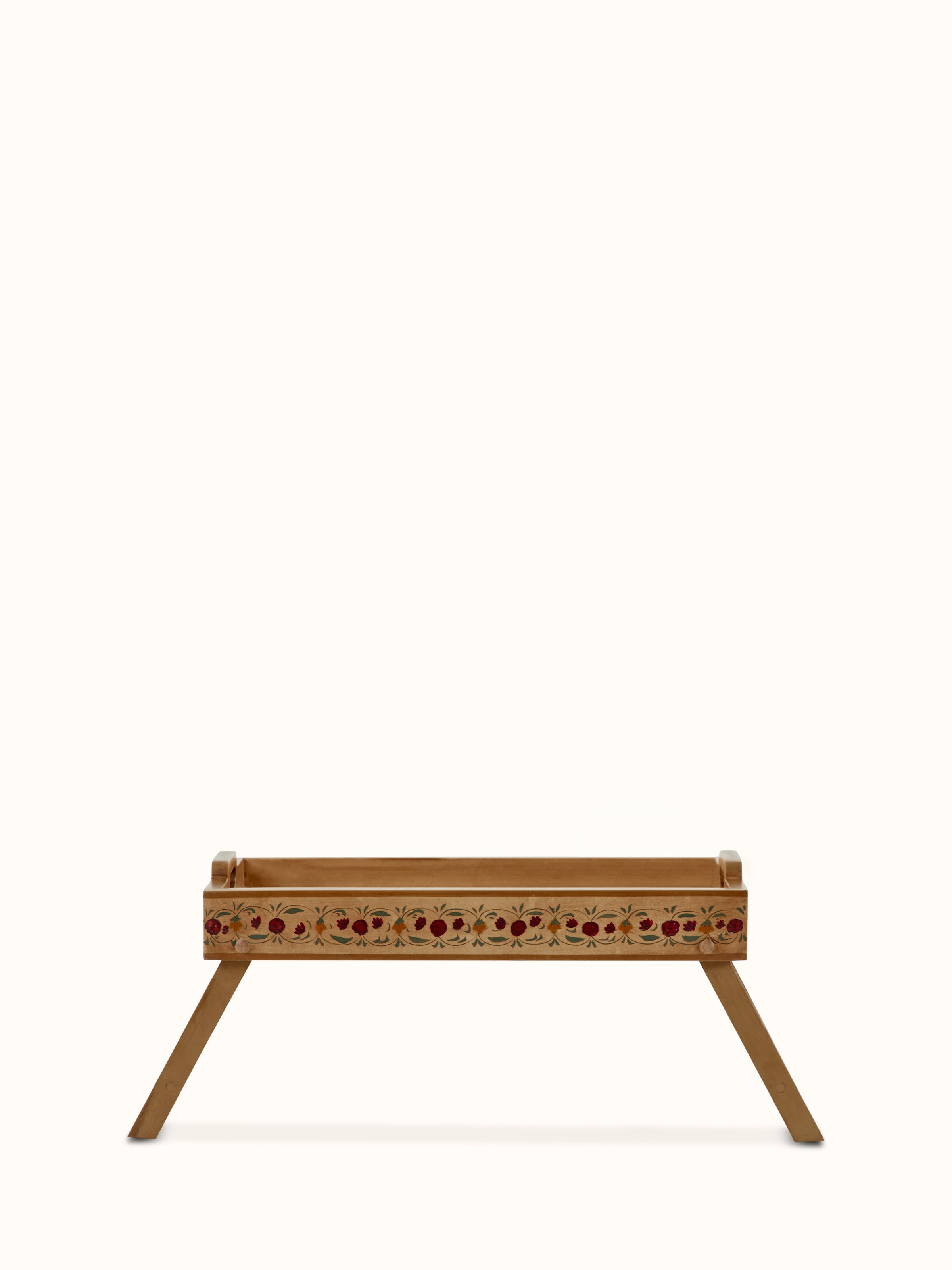 Front view of miniature painted portable table showcasing detailed artwork