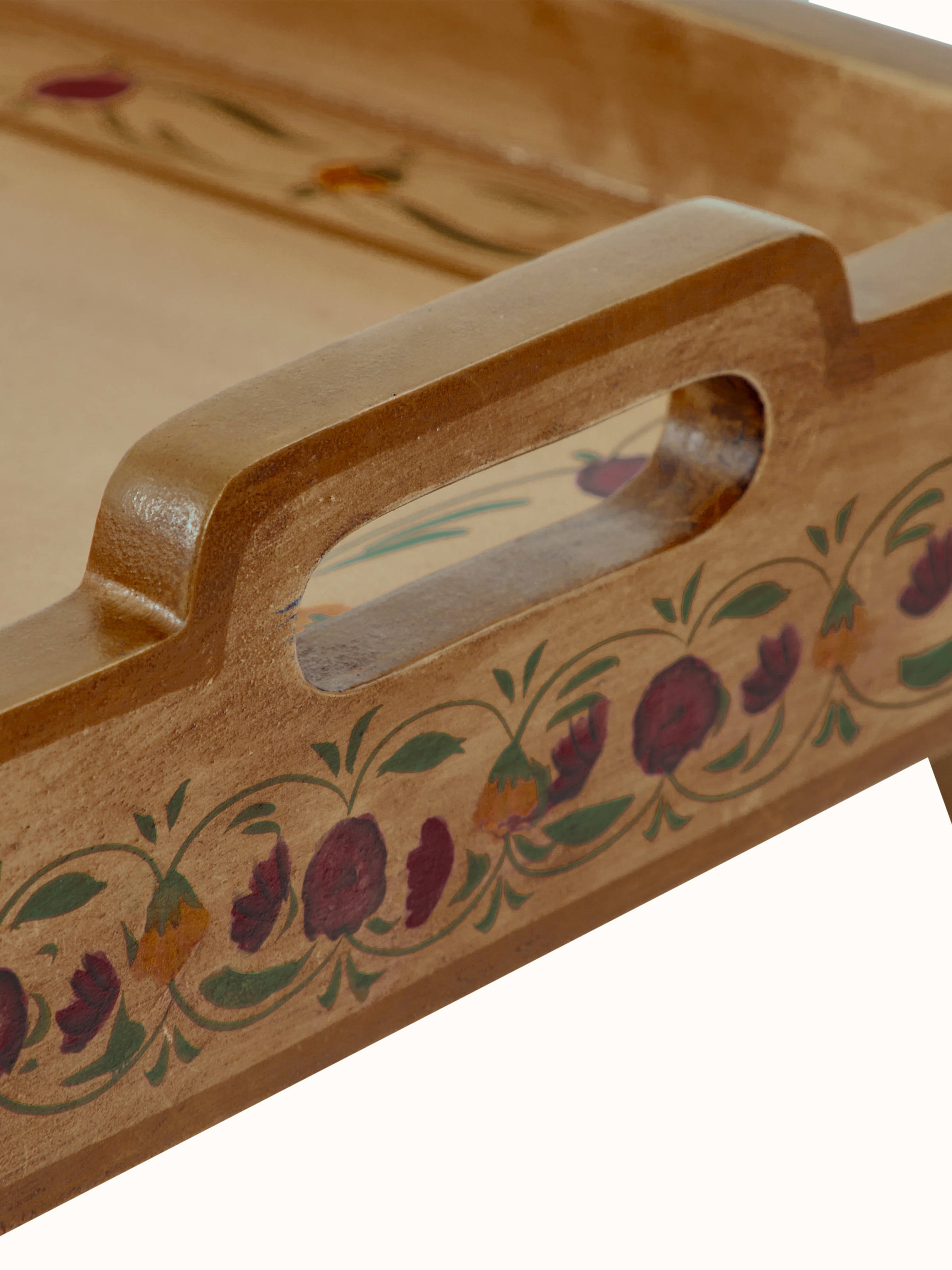 Bottom view of miniature painted portable table showing its construction