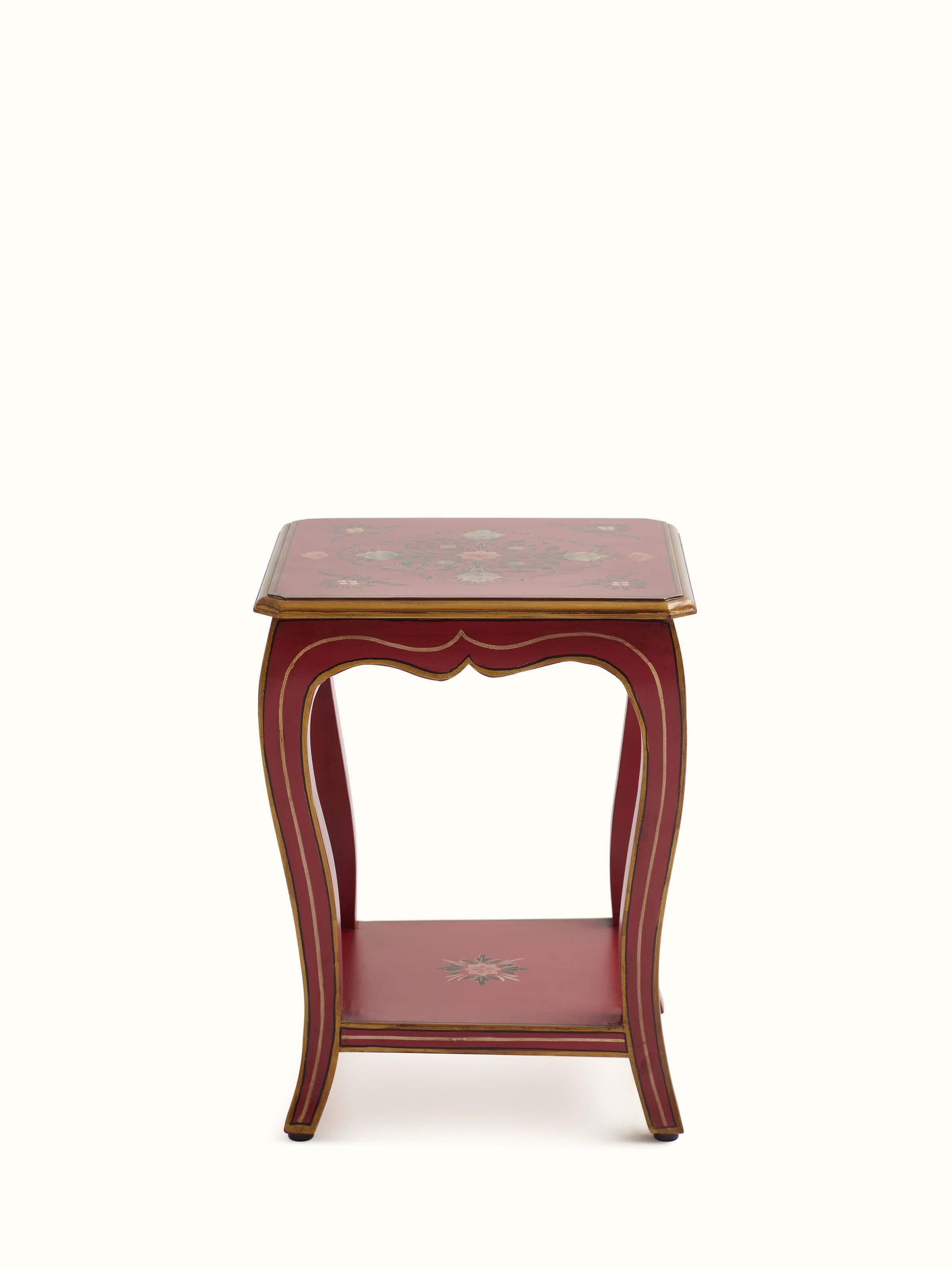 Front view of the mango wood miniature painted end & side table, showcasing intricate designs and vibrant colors