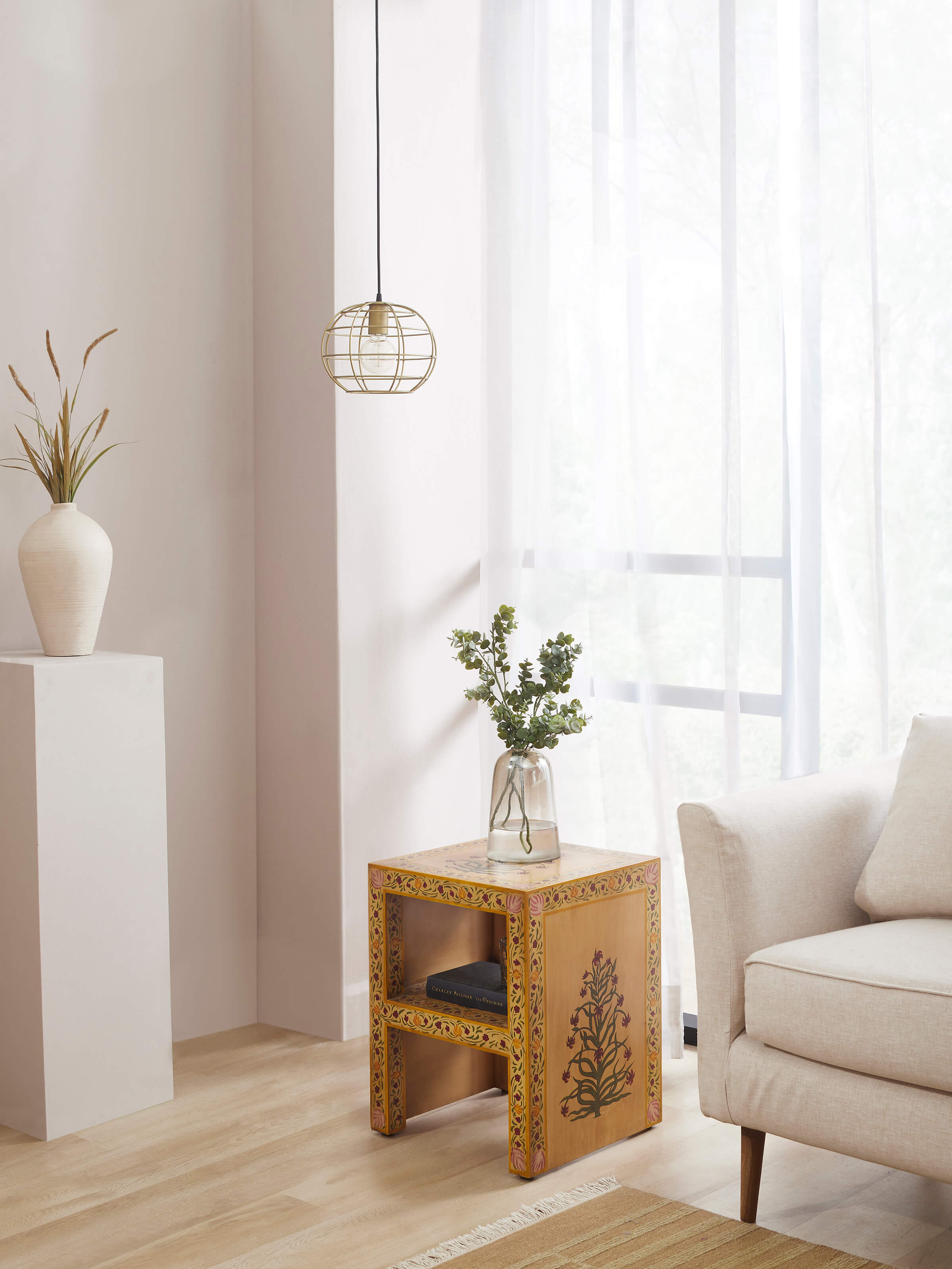 Side view of miniature painted end table, highlighting the artistic craftsmanship and vibrant colors.