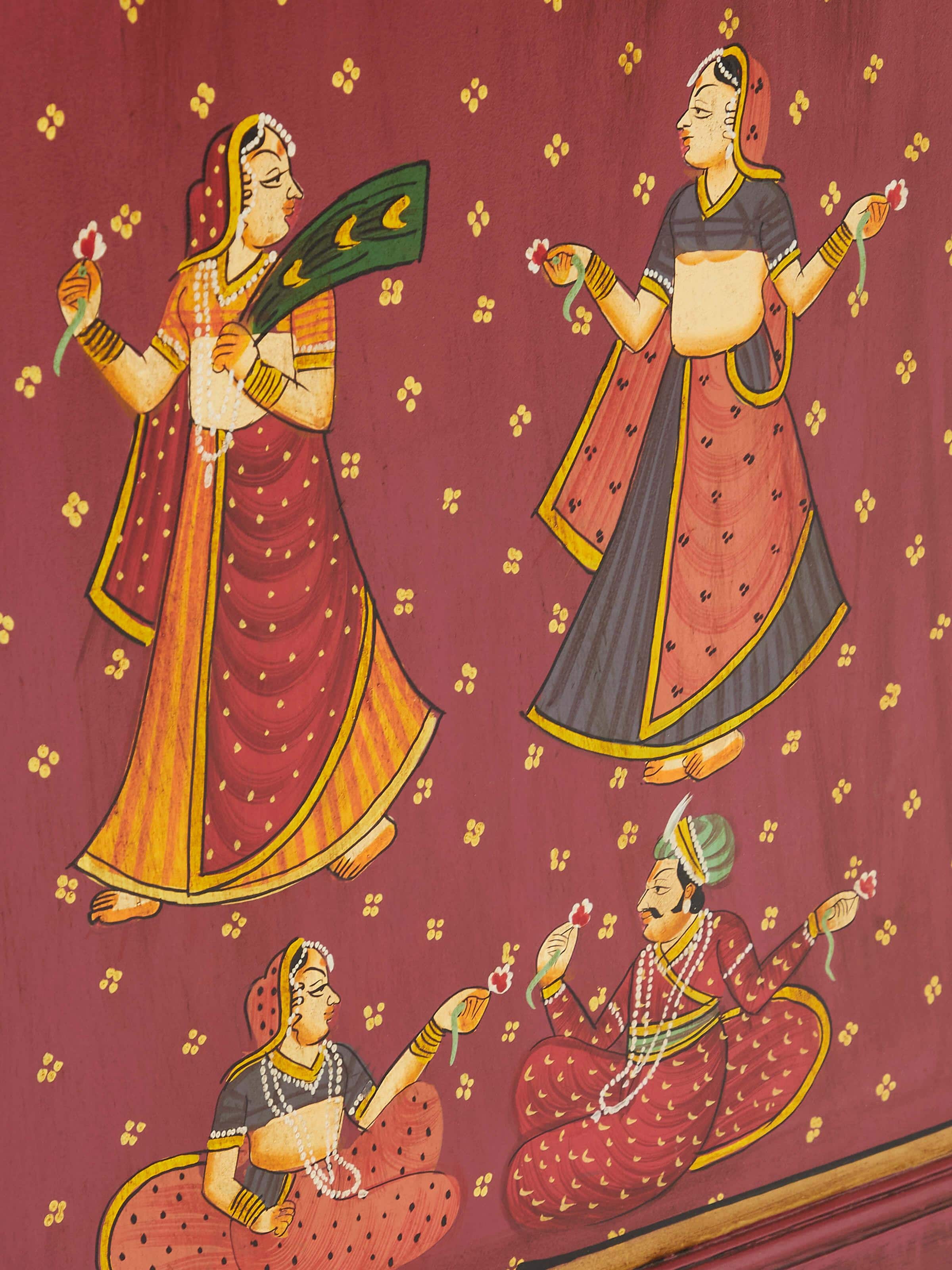 Close-up of the miniature painted wardrobe, focusing on the artistic elements and quality of paintwork.