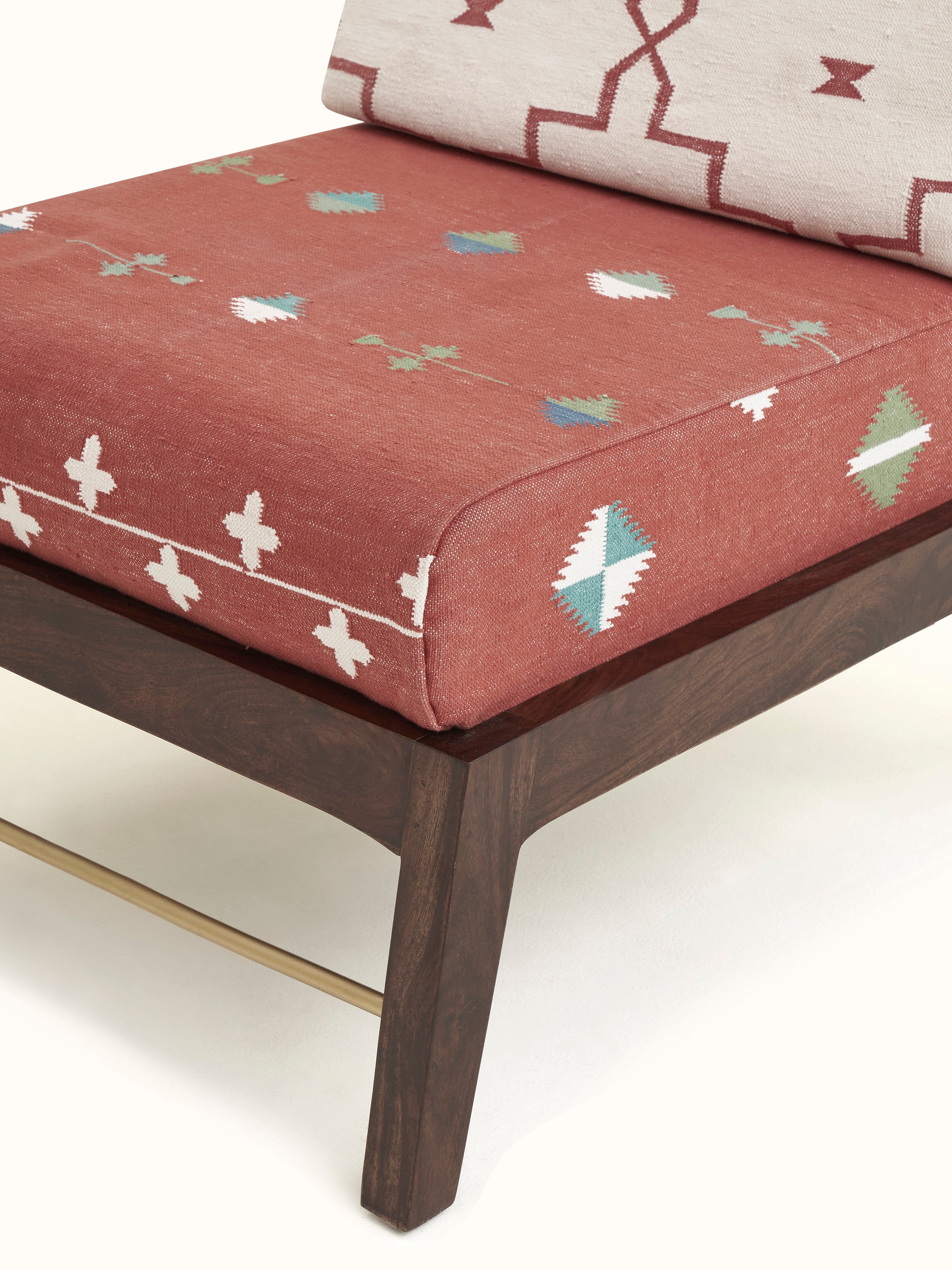 Back view of Panja Dhurrie Upholstered Sheesham Wood Lounge Chair, highlighting the solid wooden backrest and elegant fabric design.