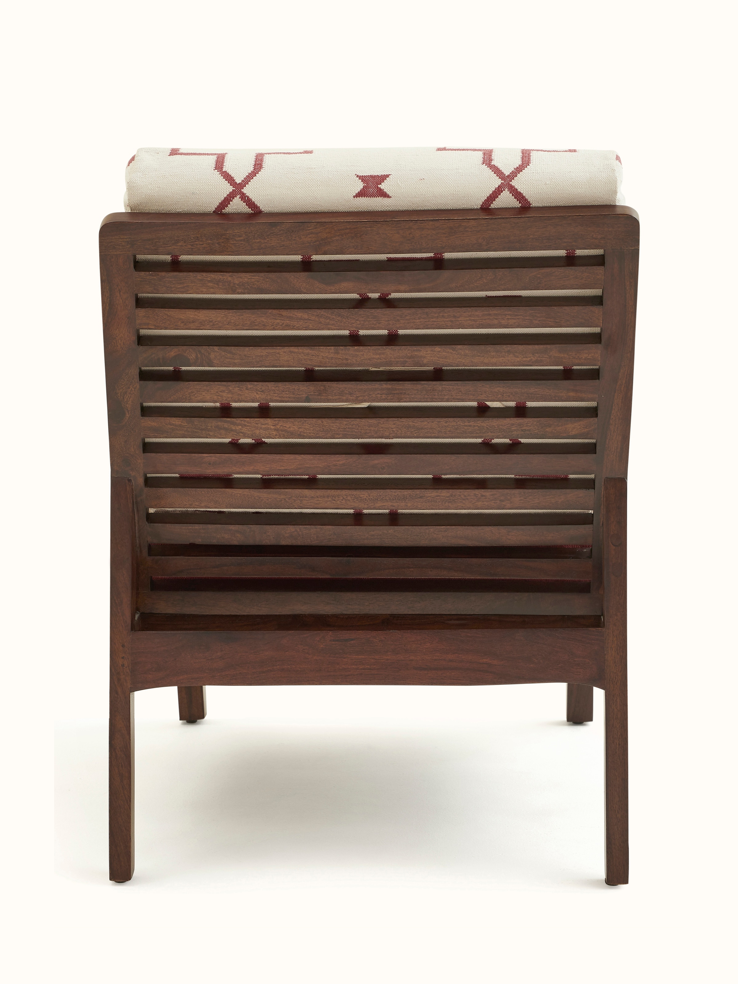Back view of Panja Dhurrie Upholstered Sheesham Wood Lounge Chair, highlighting its solid frame and comfortable cushion.