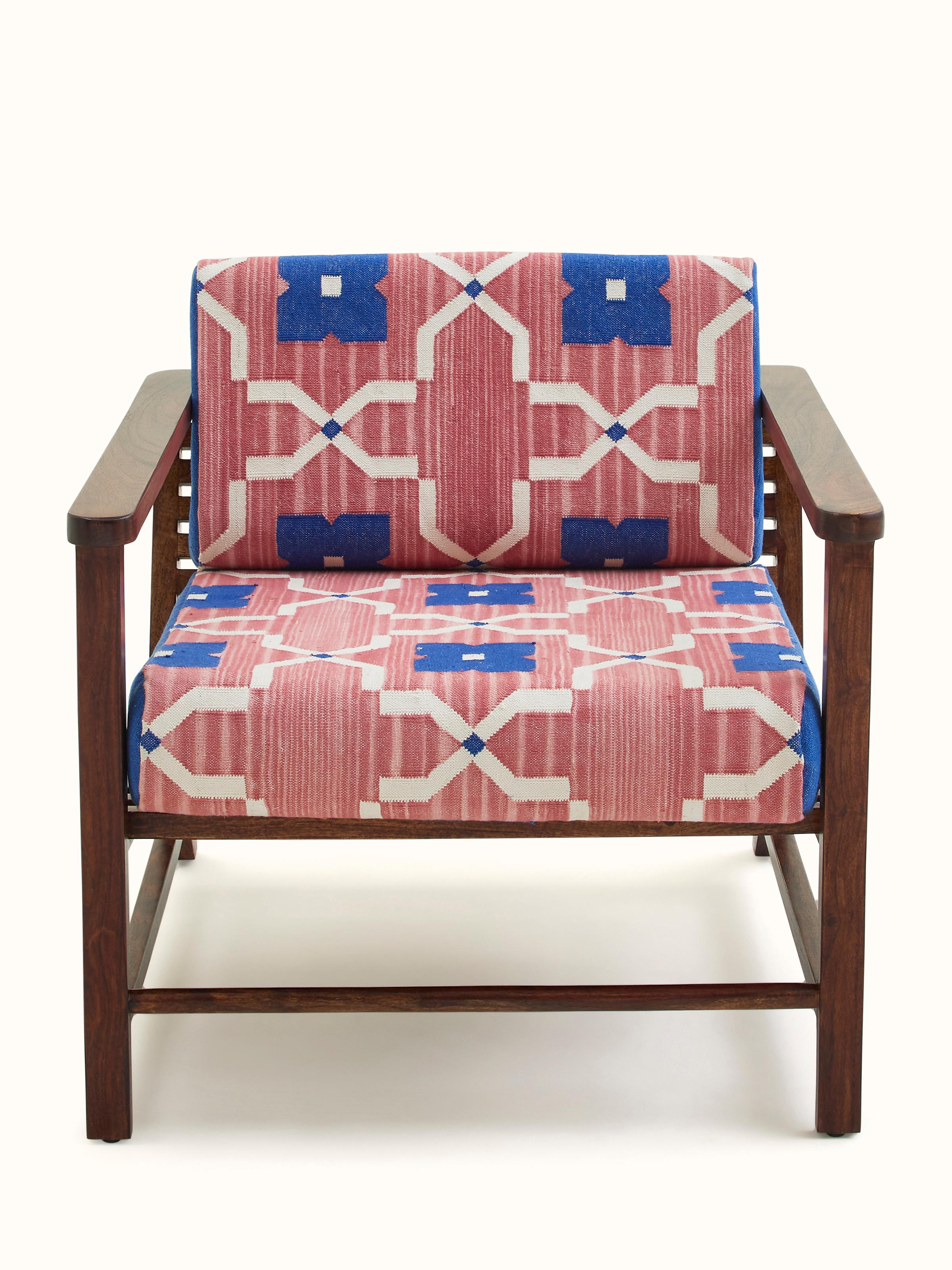 Front view of Panja Dhurrie Upholstered Sheesham Wood Lounge Chair with Arm showcasing traditional design