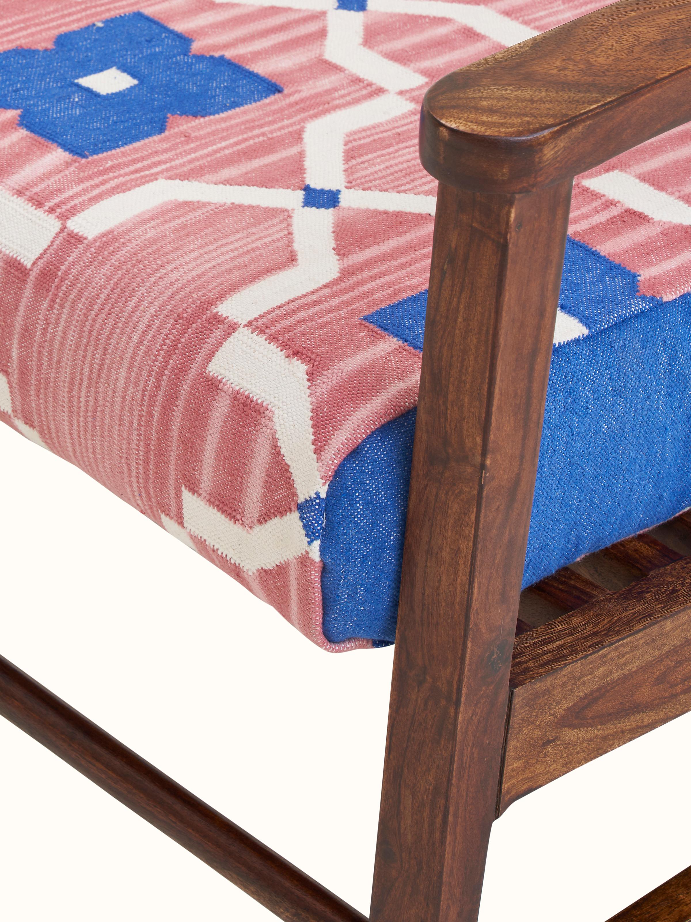 Close-up of Panja Dhurrie Upholstered Sheesham Wood Lounge Chair with Arm showing intricate upholstery details