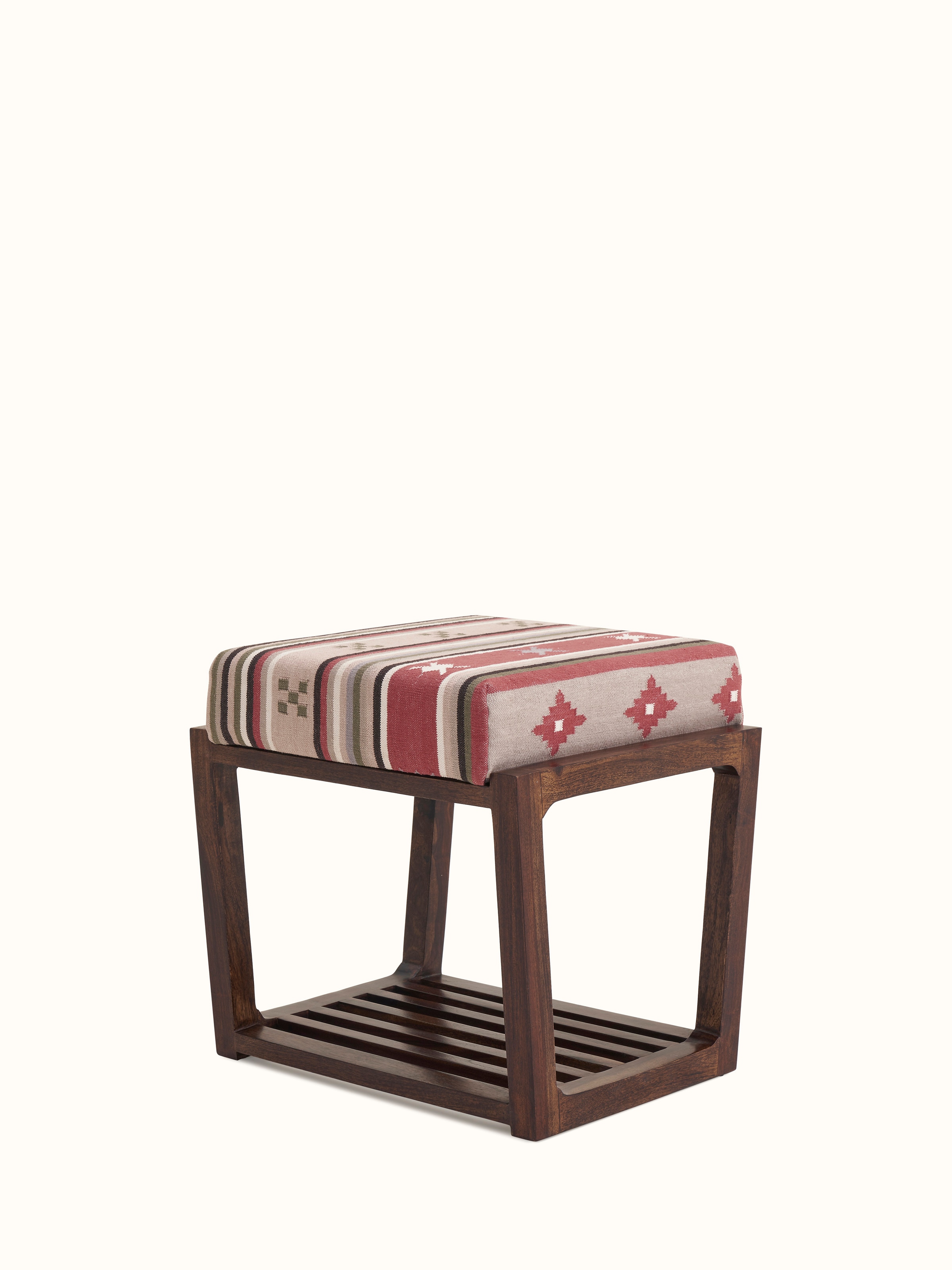 Side view of the Panja Dhurrie upholstered stool with Sheesham wood, displaying the unique slated base and the upholstered dhurrie seat.