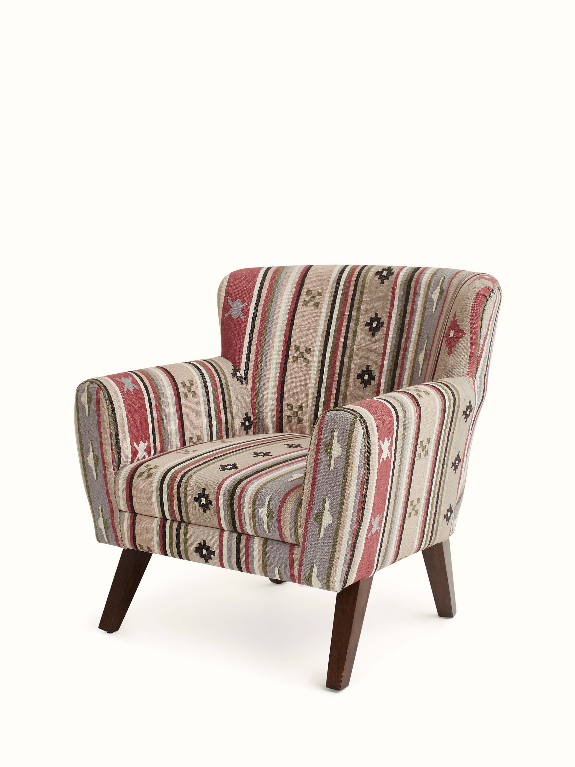 Close-up of Panja Dhurrie upholstered Sheesham wood wing chair, focusing on the detailed upholstery and craftsmanship