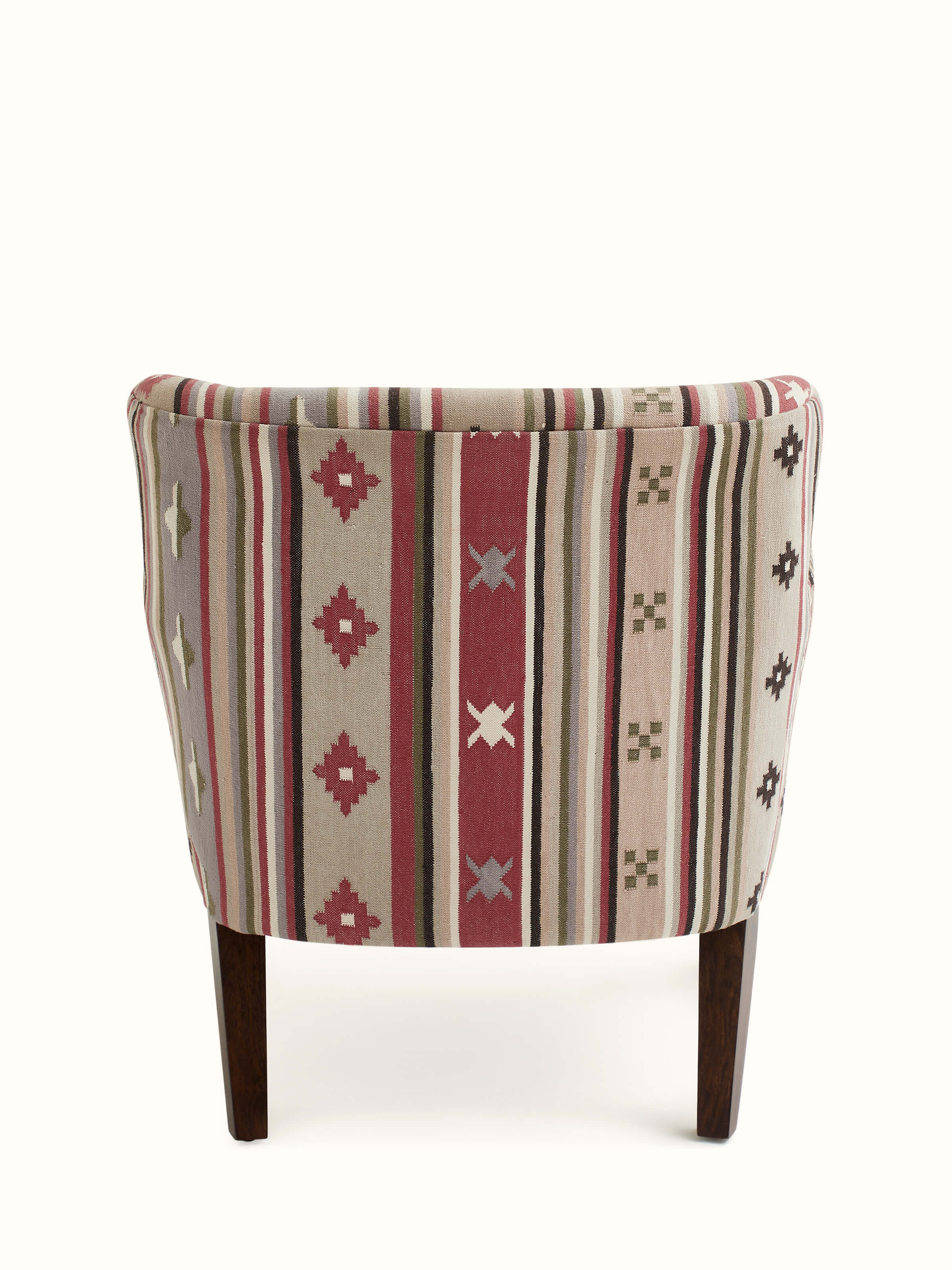Back side vies of Panja Dhurrie upholstered Sheesham wood wing chair, showcasing its features and design in motion
