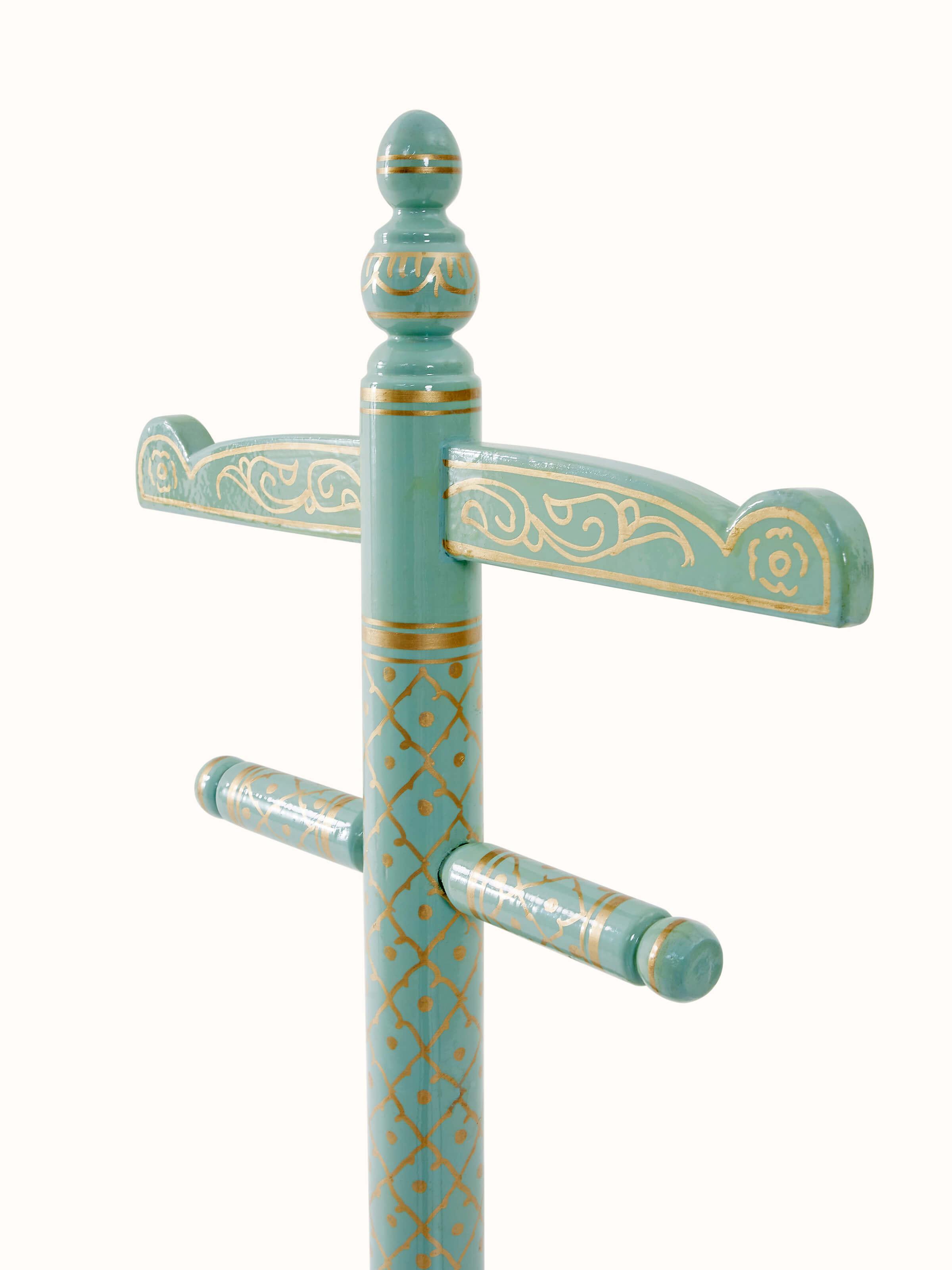 Close-up of the texture and finish of Teak Wood Sankheda Aqua Coat Hanger, highlighting the wood grain and color