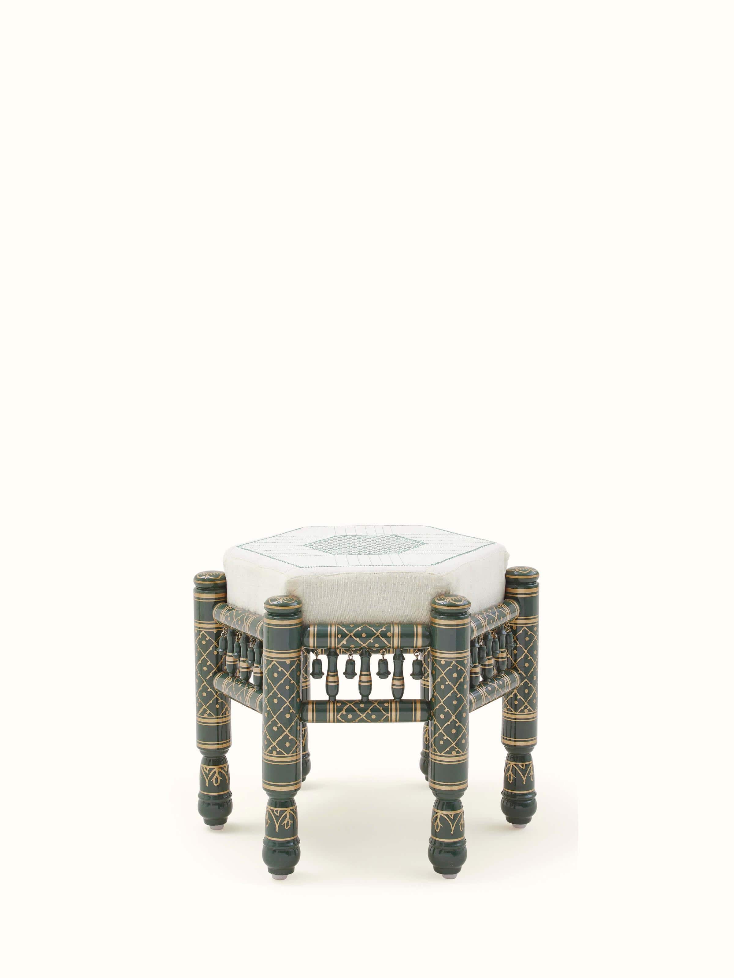 Front view of Upholstered teak wood Sankheda octagonal pouffe showcasing traditional design