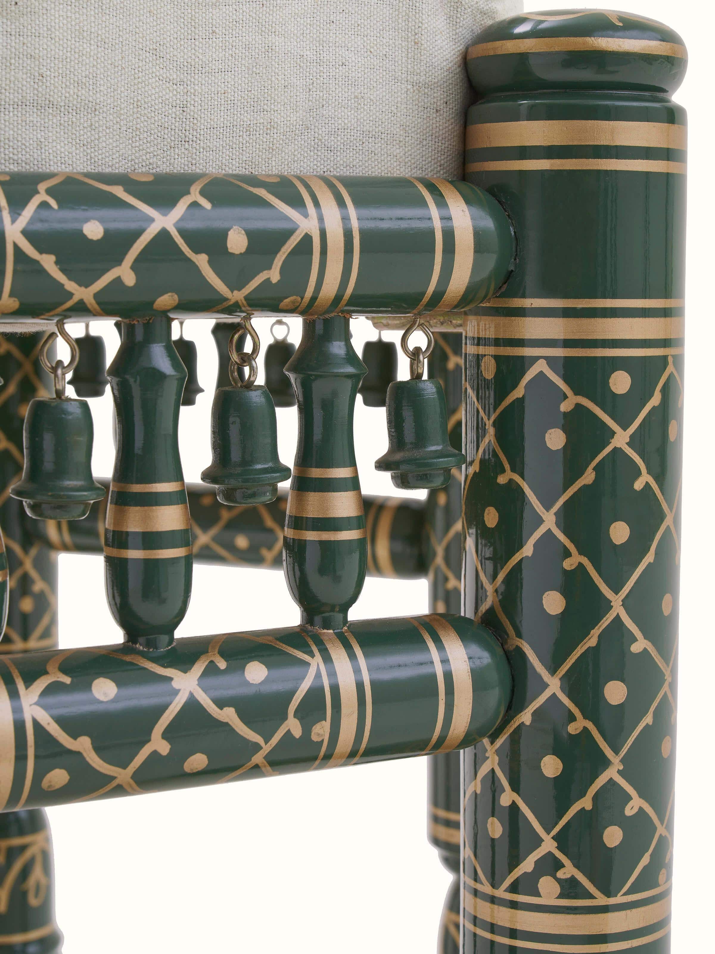 Close-up view of Upholstered teak wood Sankheda octagonal pouffe showing upholstery detail