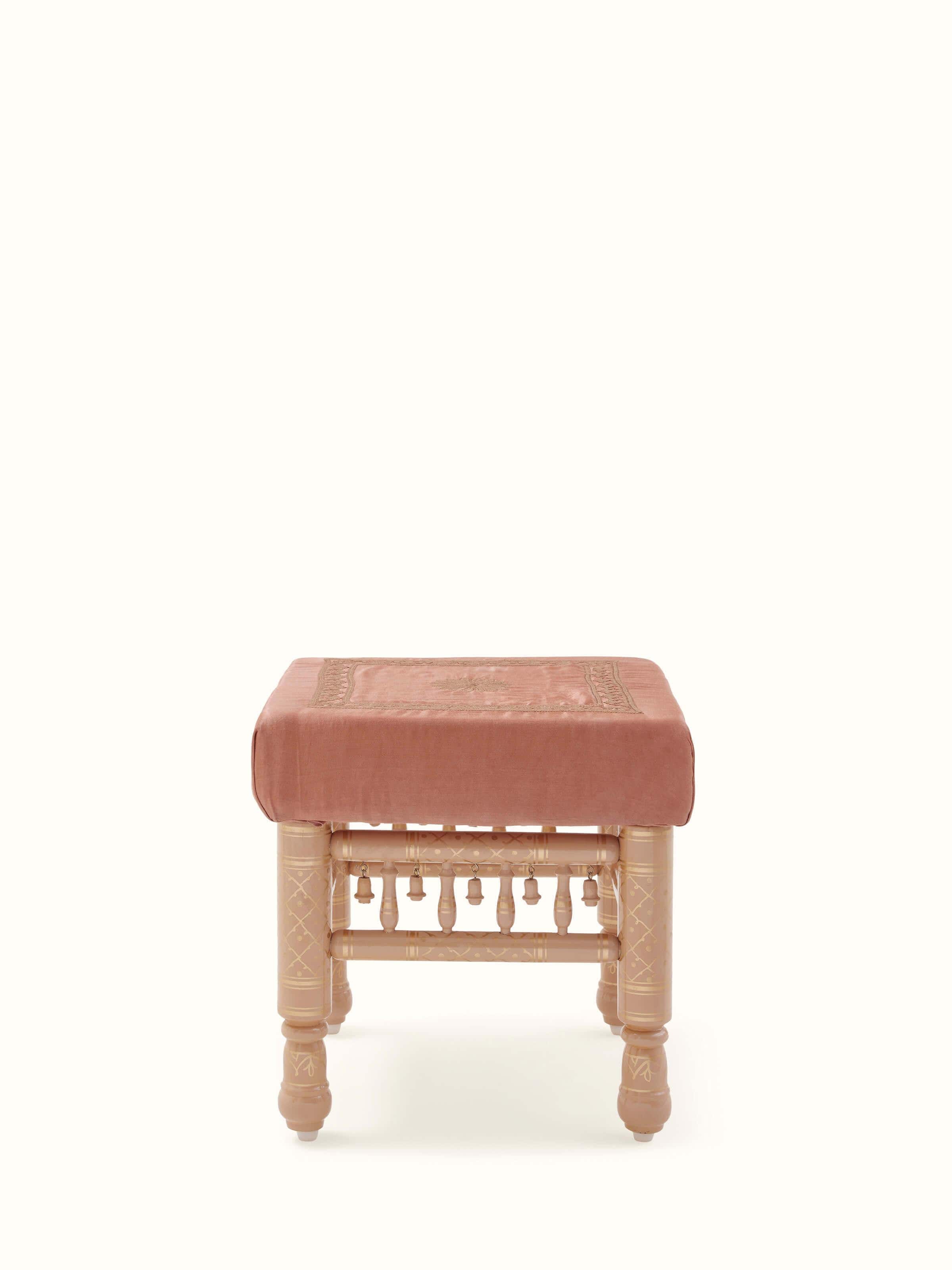 Front view of the Teak wood Sankheda upholstered stool, highlighting the detailed craftsmanship and upholstery