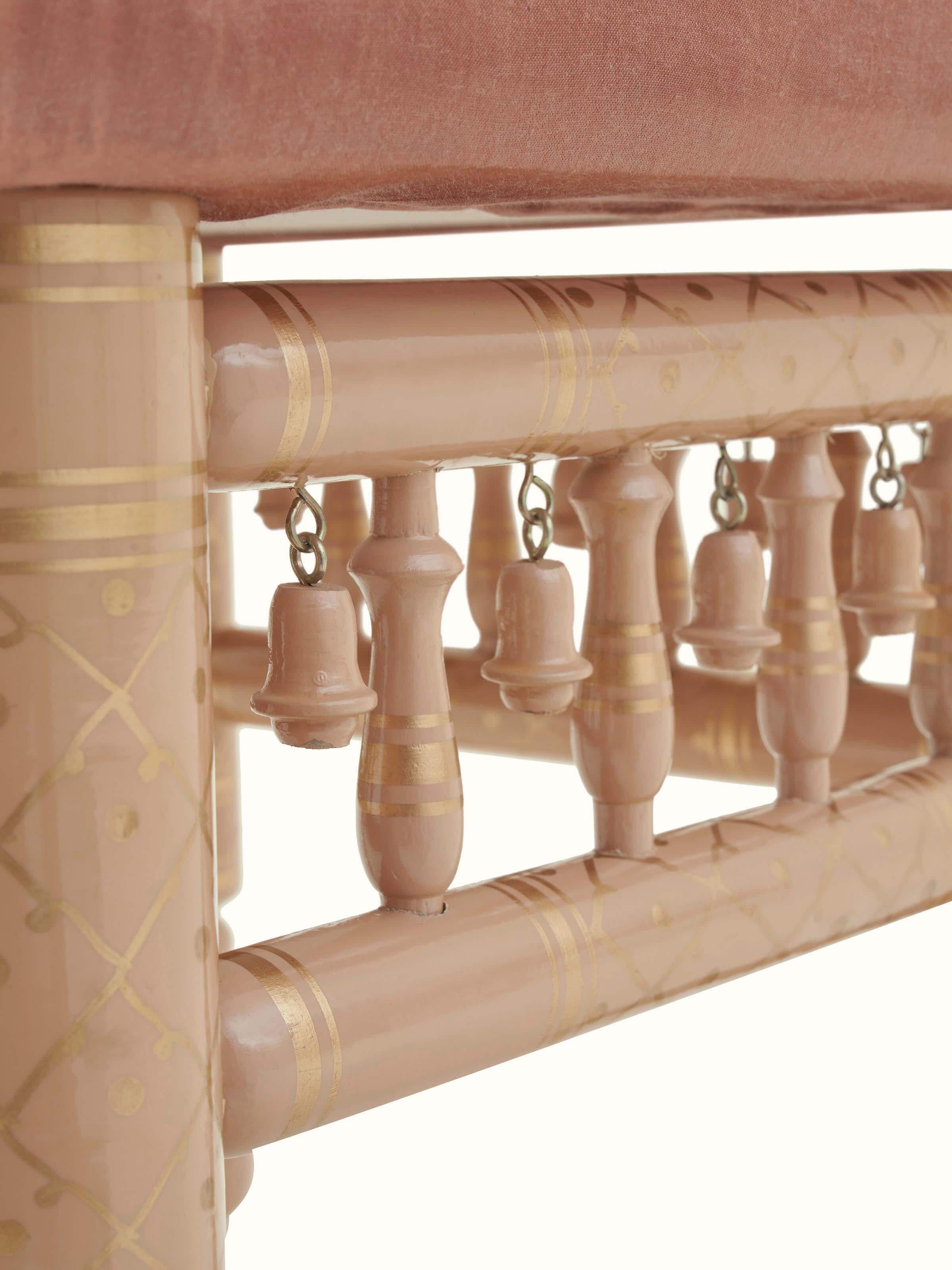 View of the upholstered seat and Teak wood base, focusing on the texture and design