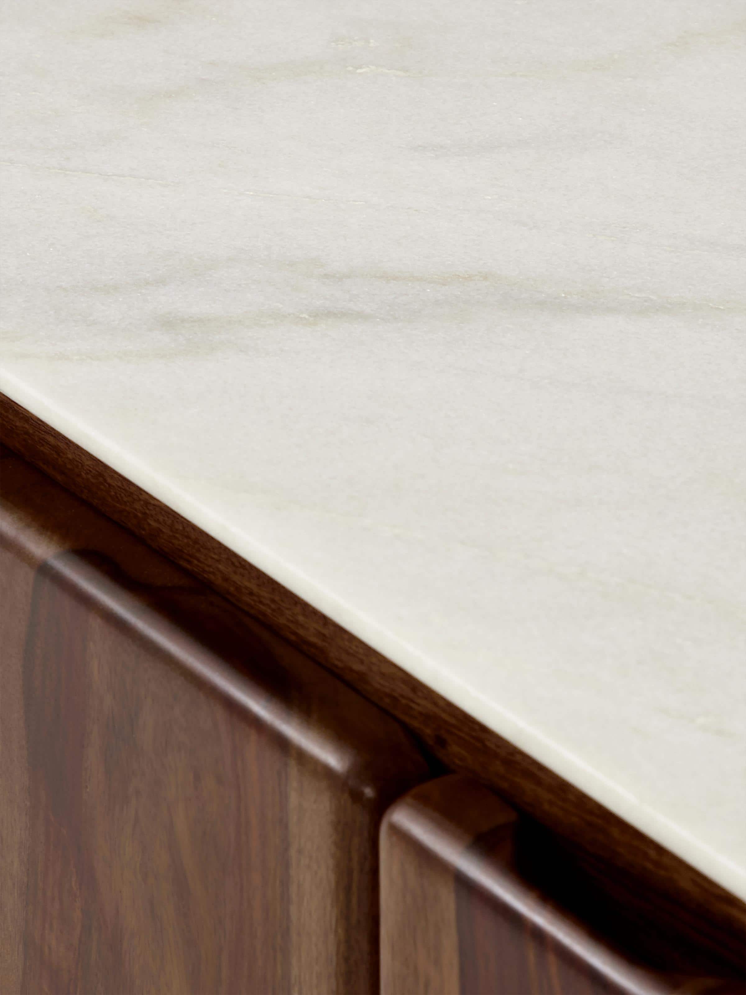 Back view of walnut finish carved marble & sheesham wood sideboard showcasing solid construction