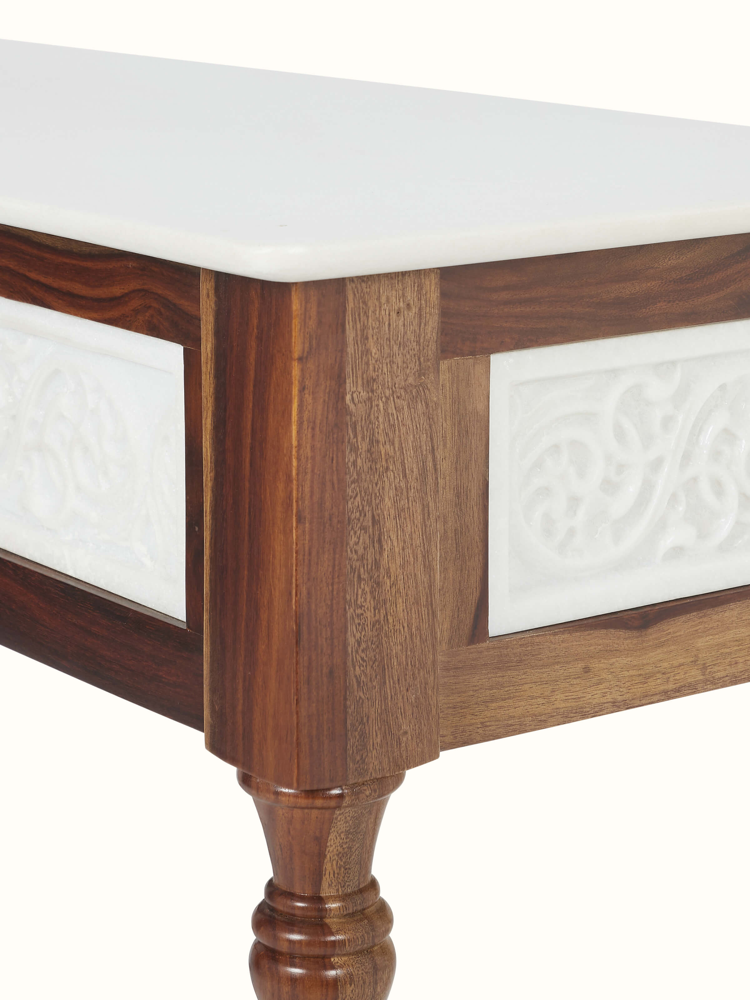Detailed view of the carved Sheesham wood legs of the walnut finish marble console table, highlighting the fine woodwork