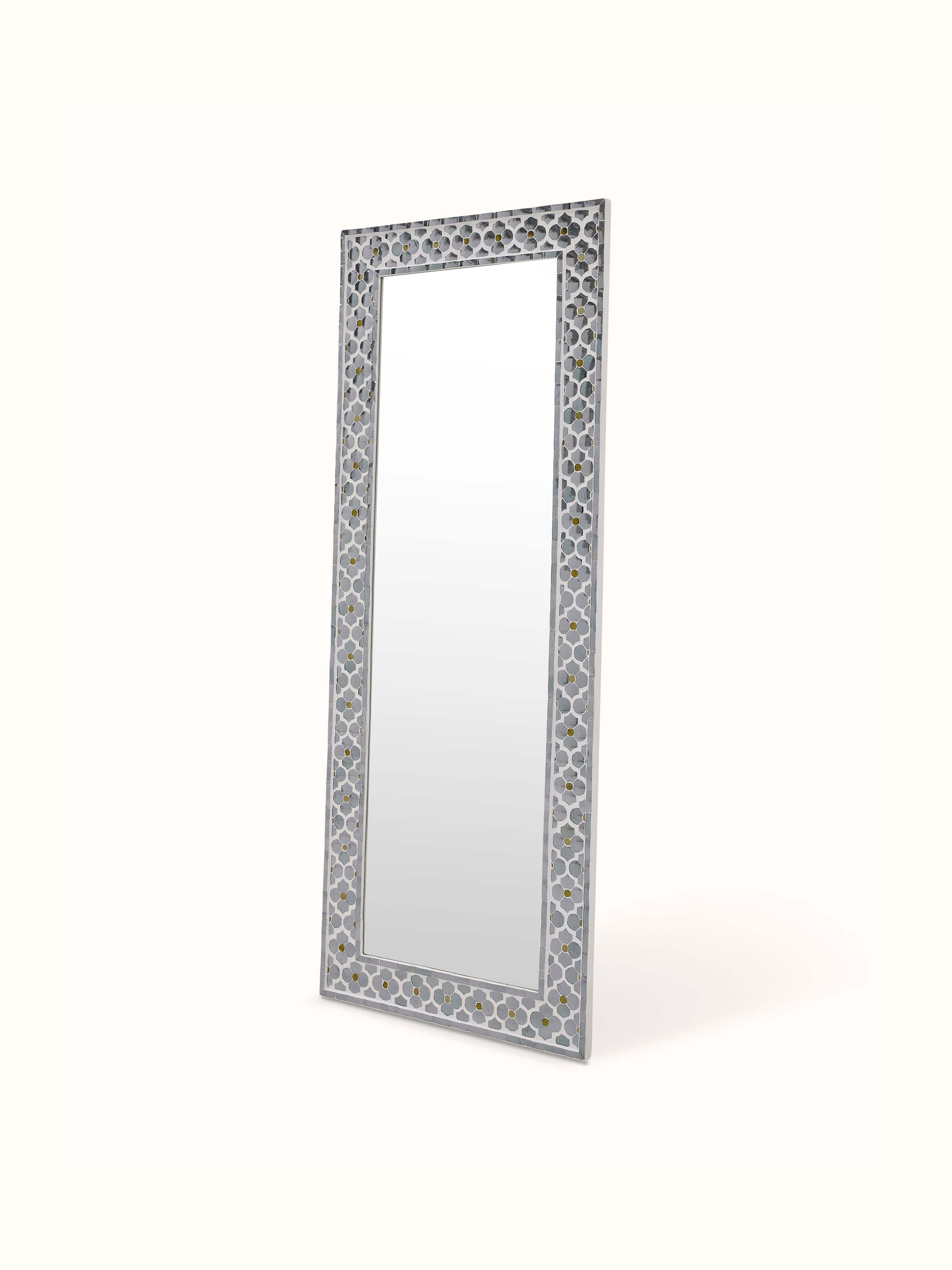 Close-up of the floral inlay details on the rectangular glass mirror, highlighting the intricate design and craftsmanship