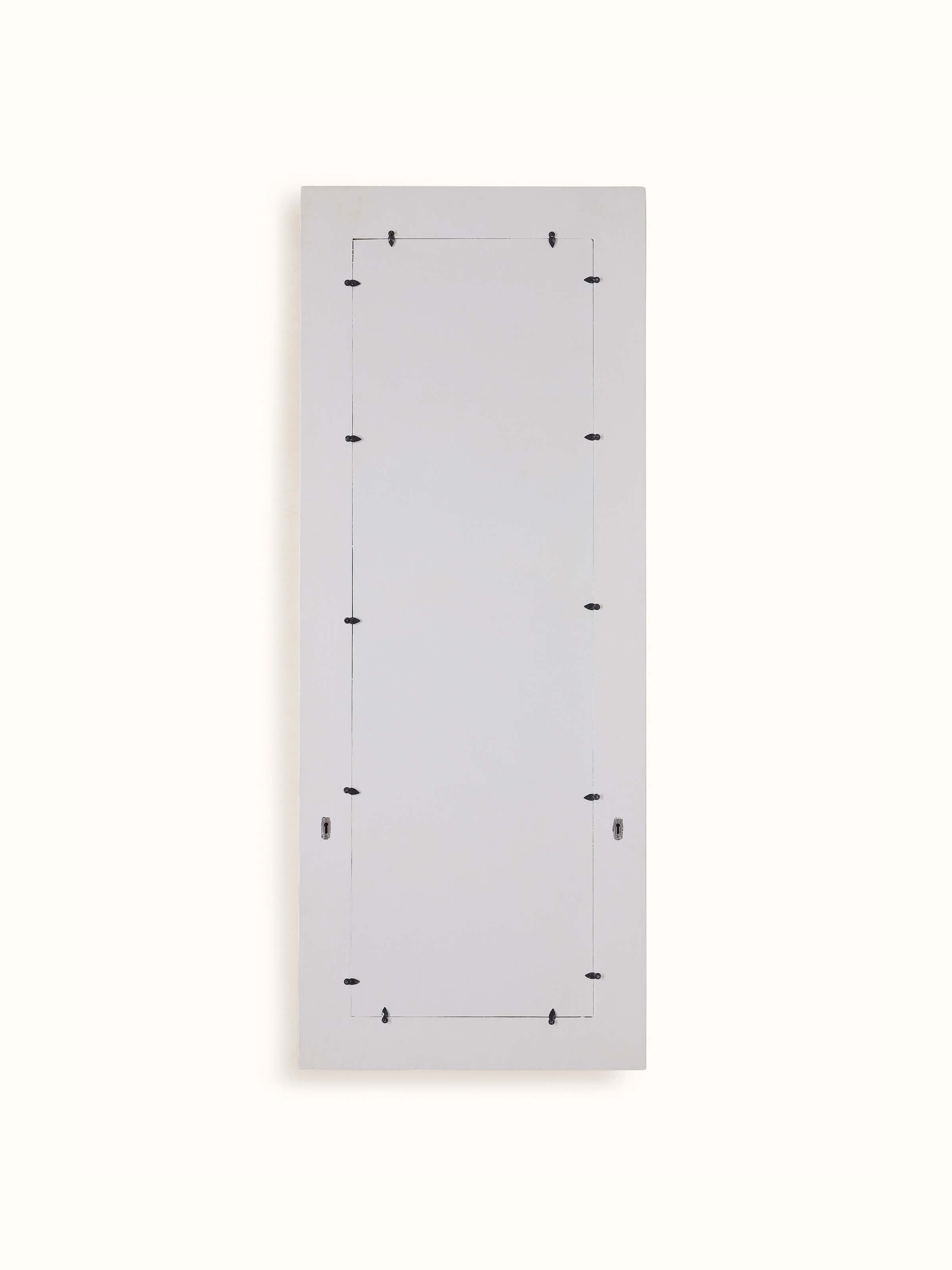 Full-length view of the glass floral inlay mirror in a room setting, illustrating its size and how it enhances the space