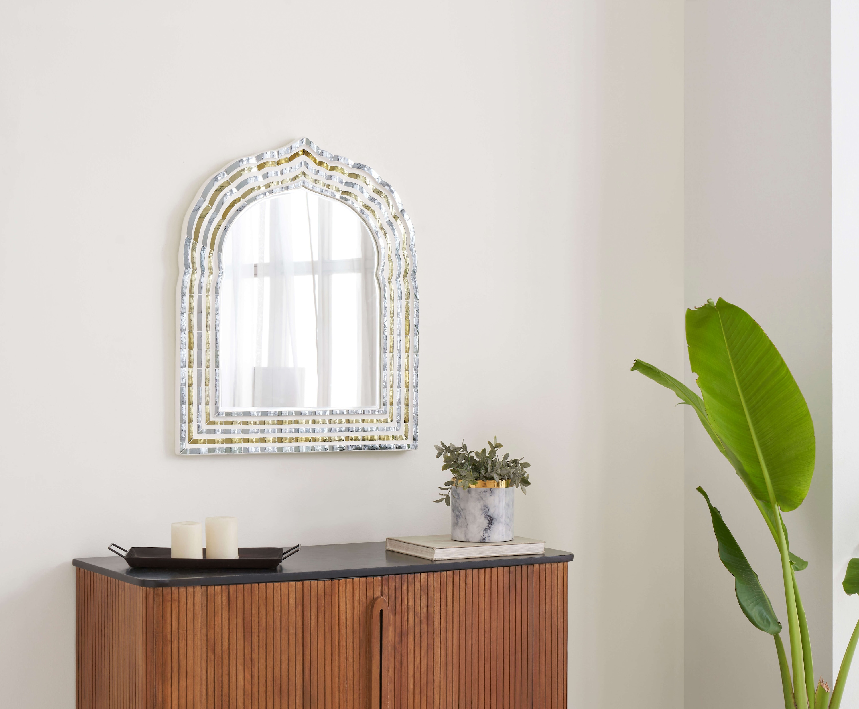 Side view of Swadesh Glass Floral Inlay Arch Wall Mirror displaying delicate floral patterns and sleek frame